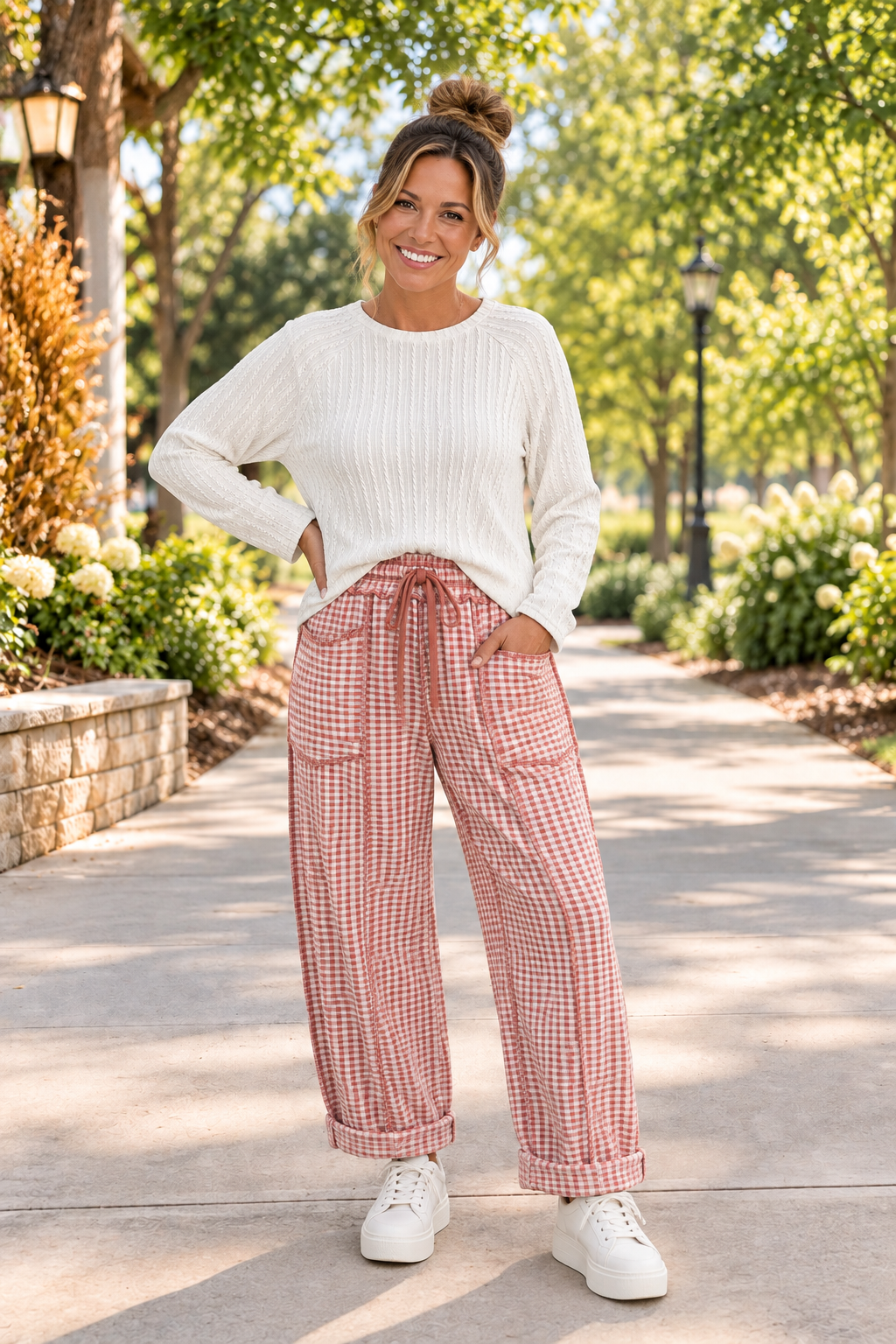 The Reece Pants in red and cream gingham with wide cuffed legs, a drawstring waist, front pockets, and vertical seams front view.