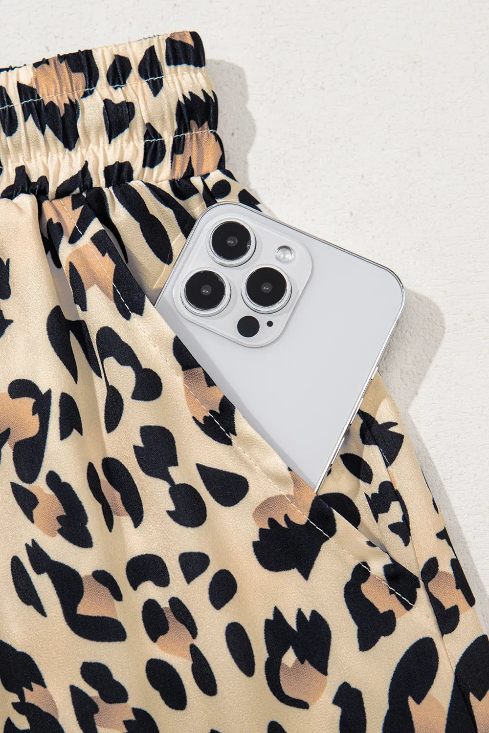 Pants, leopard print, high waist, elastic waistband, drawstring, pocketed, wide leg no stretch close up view
