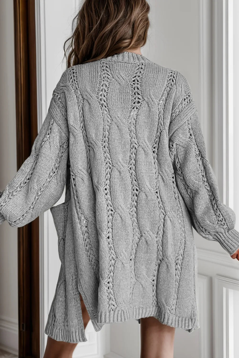 Cardigan, long sleeve, drop shoulder, open front, cable-knit, side slit, openwork, no buttons, pocketed, stretchy back view
