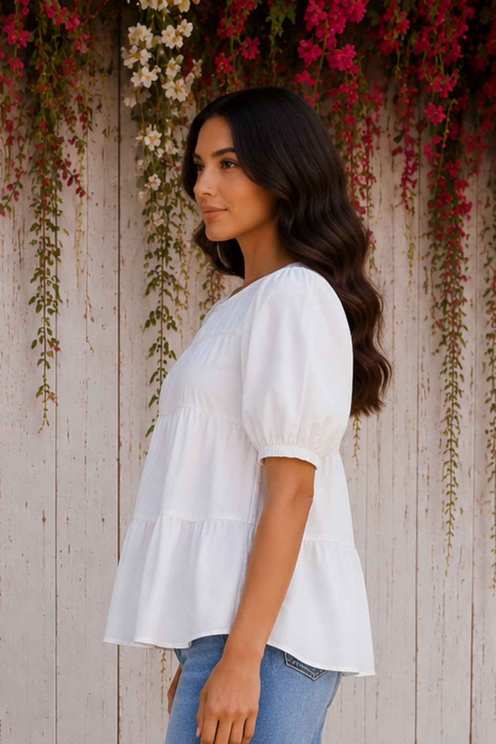 * Round neck
* Short puff sleeve
* Smocked
* Tiered
* Ruffled
* Keyhole closure
* No stretch