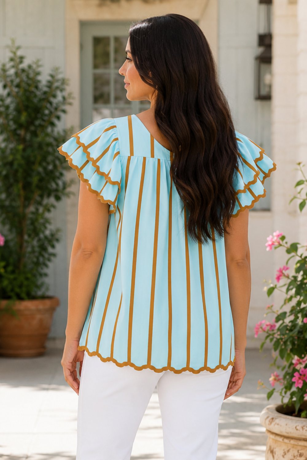 * V-neck
* Ruffle sleeves
* Ricrac trim
* Pleated
* No stretch