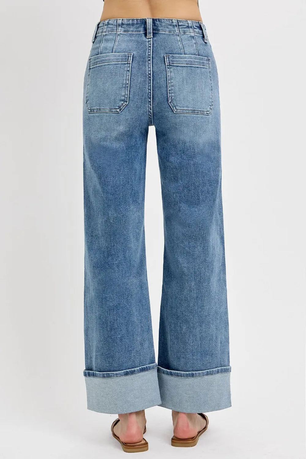 Risen Jeans, high-waisted, front patch pockets, button up, light wash, wide leg, cuffed, slightly stretchy back view
