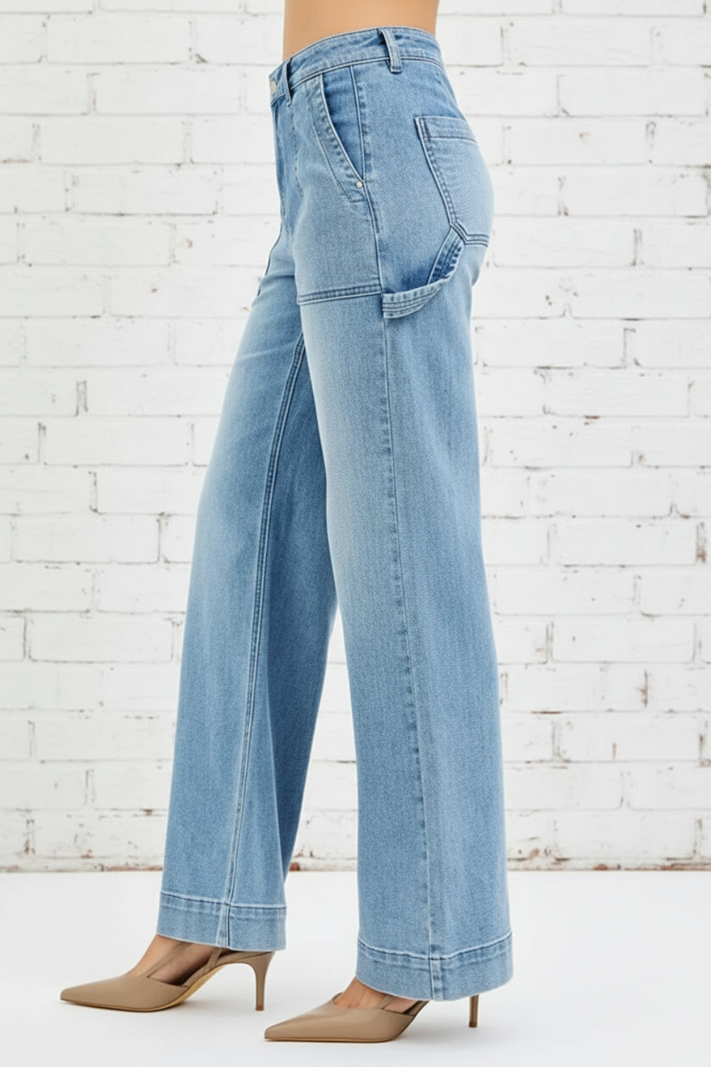 Risen Jeans, full-size, high-rise, straight let, light wash, front patch pockets, back pockets, long hem, button/zipper closure, belt loops, hammer loops on side, slightly stretchy, side view
