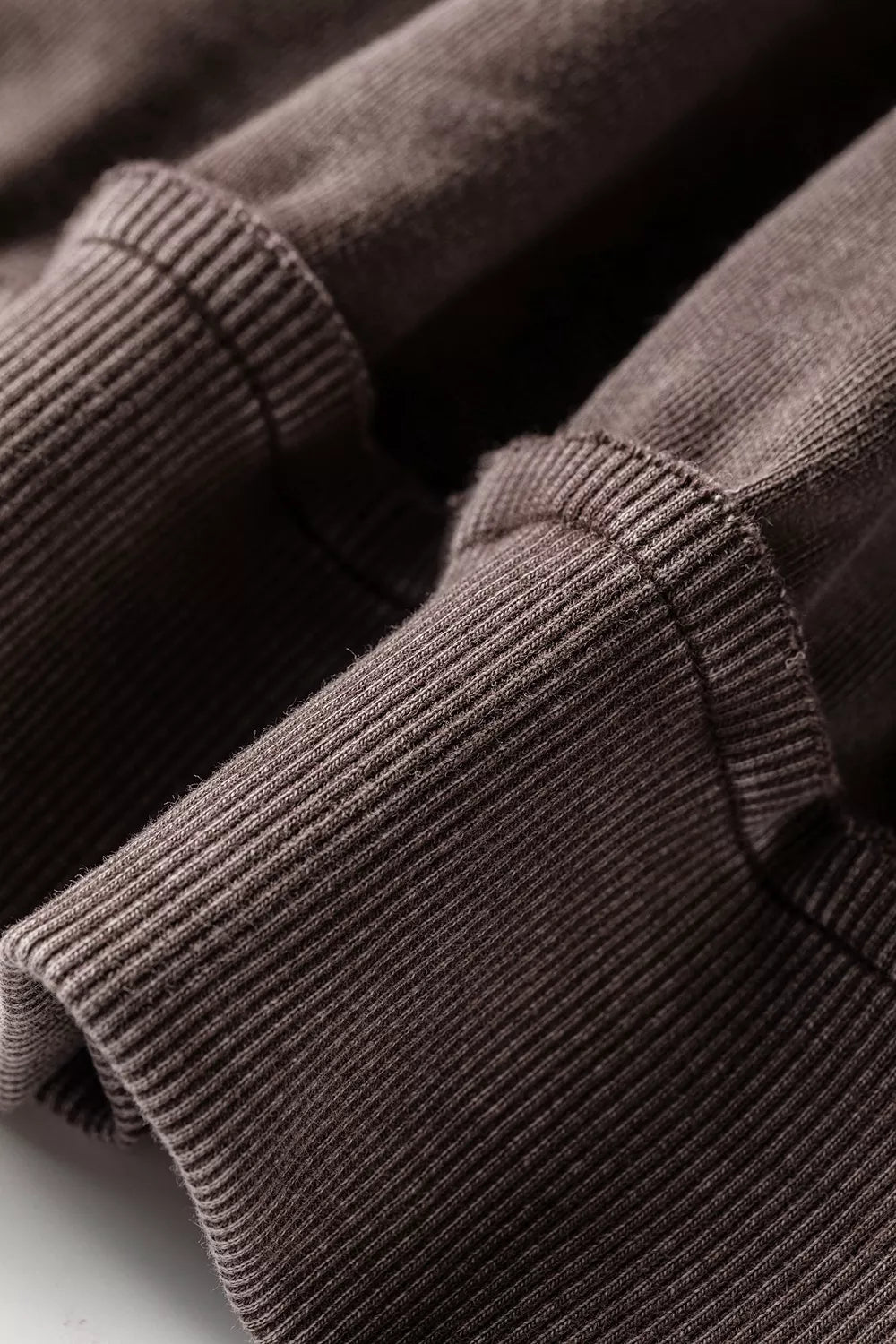 Always On Time Top in washed mocha brown with subtle textured pattern, relaxed fit, wide long sleeves, V-stitch neckline and ribbed hem.