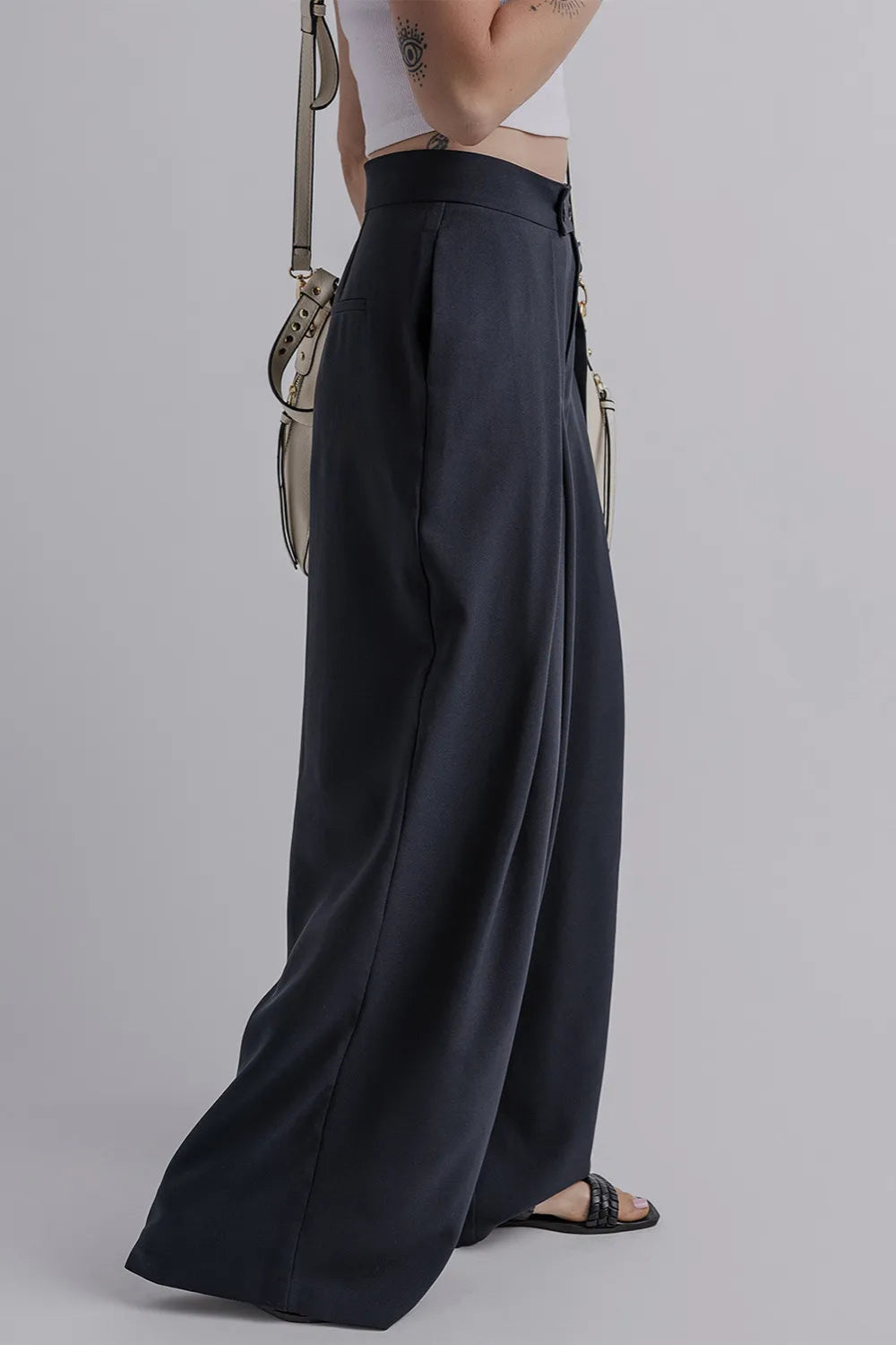 Pants, double button and zipper closure, large pleats, pocketed, wide leg, long, opaque, no stretch side view