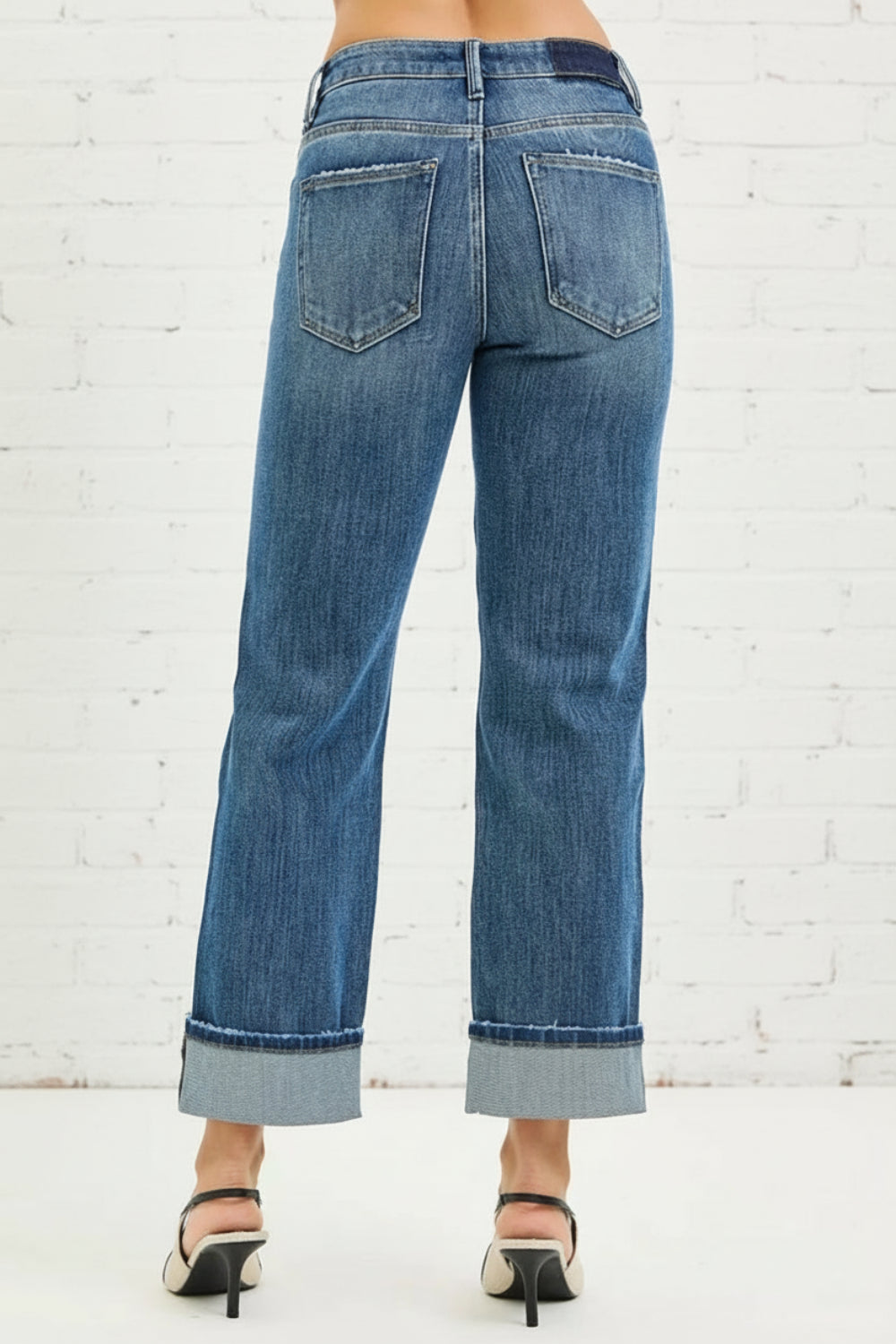 Risen Jeans, full-size, mid-rise, 4-way stretch, cuffed hem, straight leg, dark wash, belt loops, button/zipper closure, pocketed, raw hem, slightly stretchy, back view