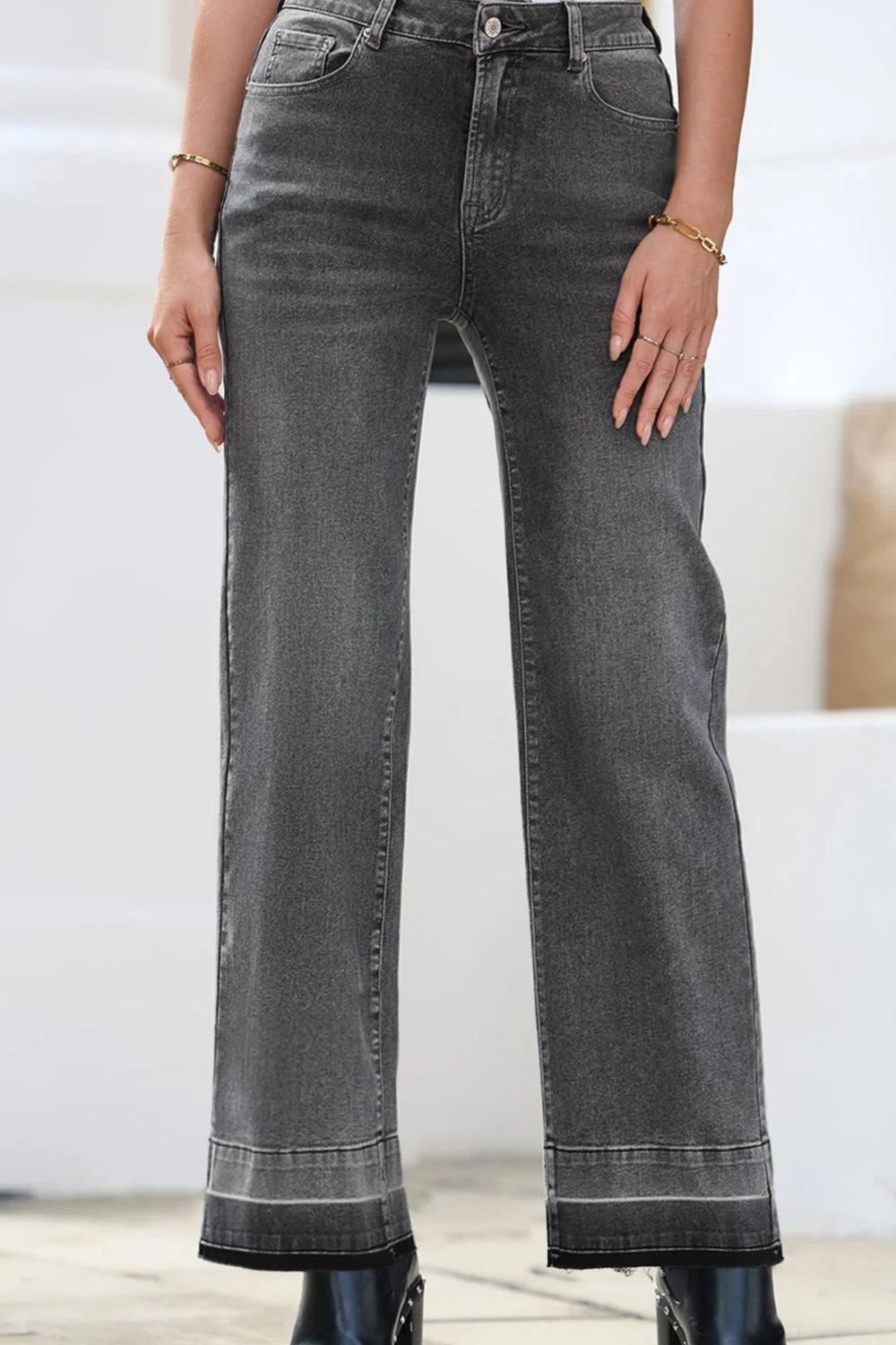 Jeans, high-rise, drop hem, raw hem, straight leg, pocketed, belt loops, button/zipper closure, vintage wash, some stretch, front view
