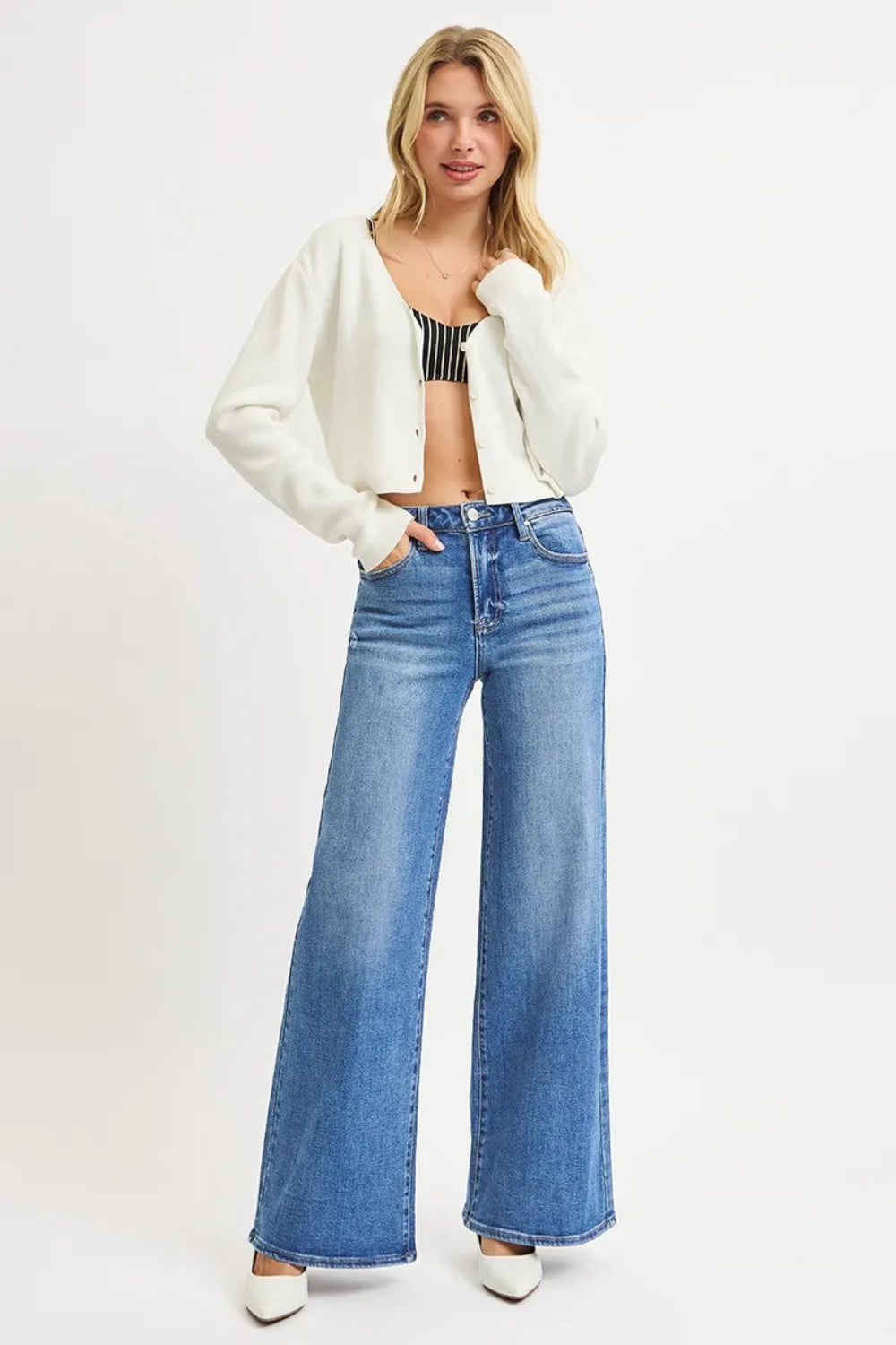 Risen jeans, full-size, high-rise, wide leg, vintage medium wash, 5-pocket detail, button-zipper closure, belt loop detail, slightly stretchy, front view