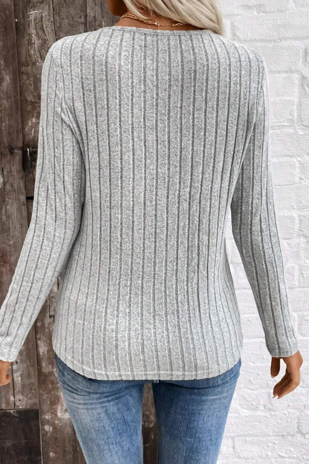 T-shirt, v-neck, long sleeve, ribbed, rounded hem, some stretch, back view