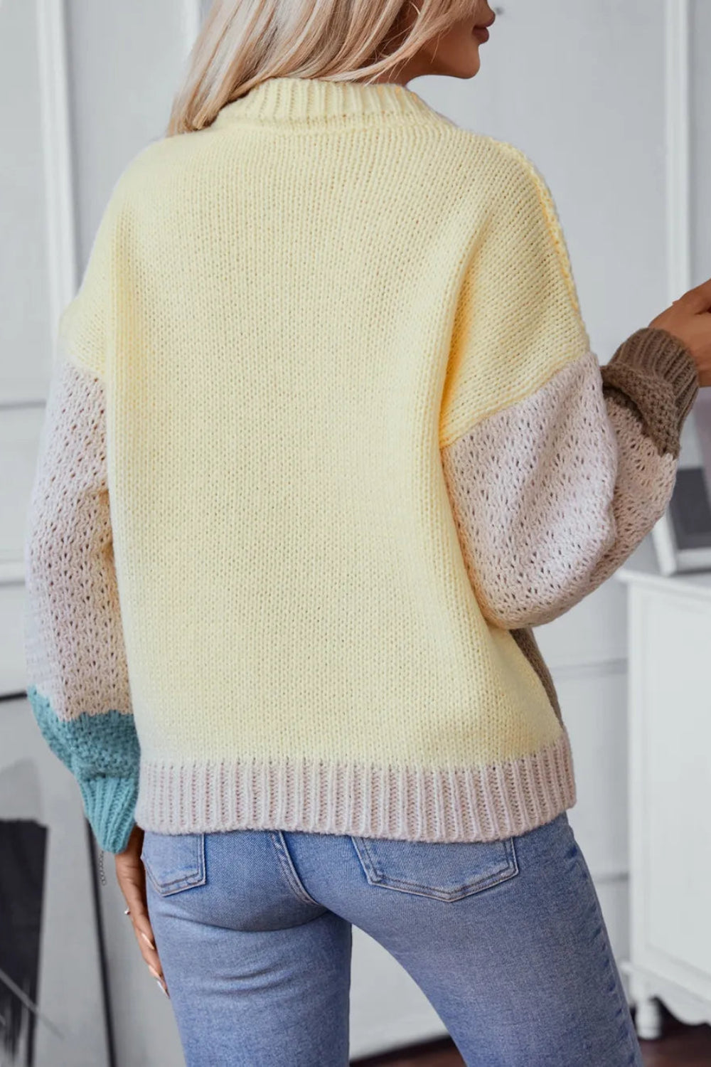 Sweater, pullover, drop shoulder, long sleeve, round neck, ribbed knit, ribbed neck, cuff and hem, balloon sleeves, slightly stretchy, back view
