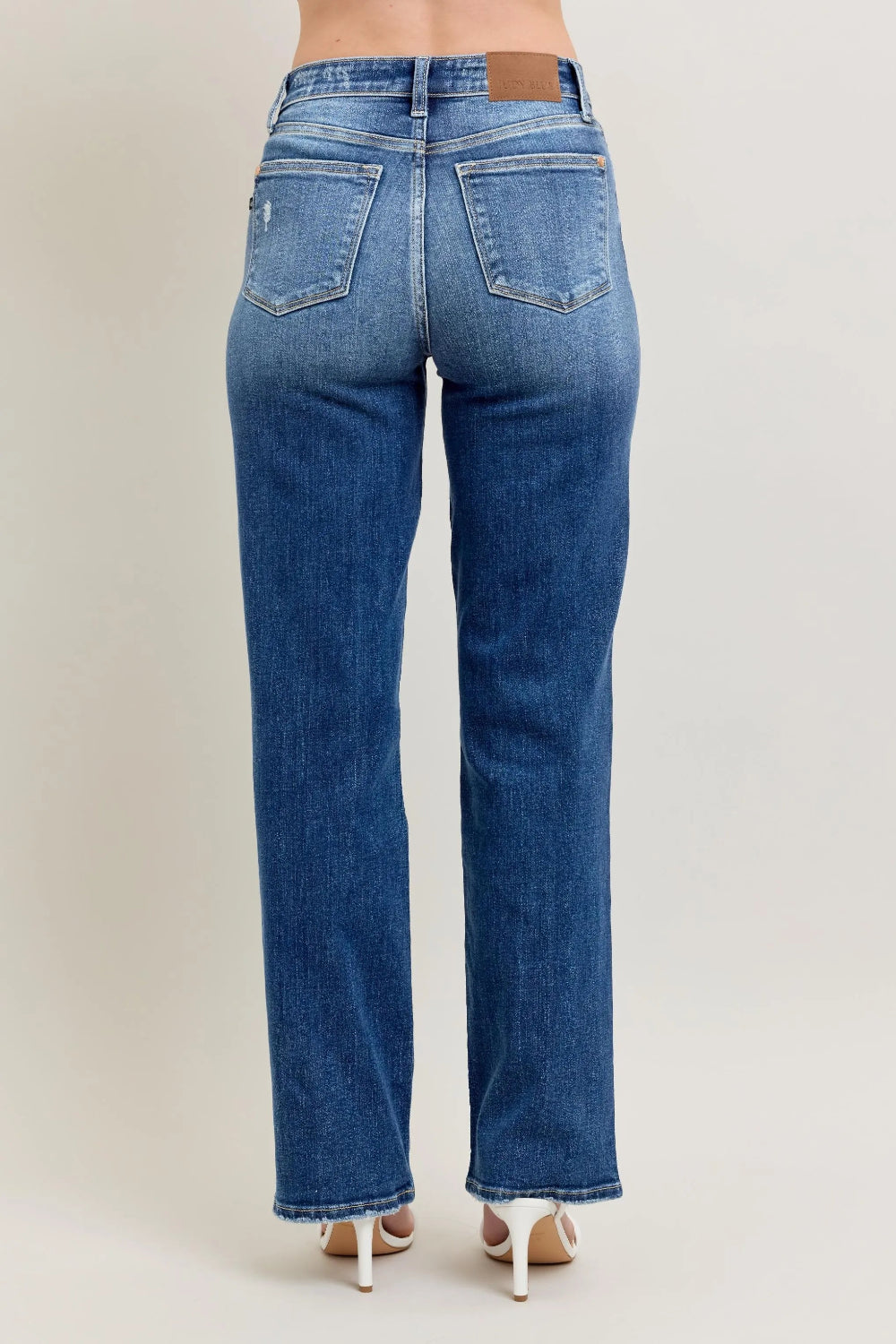 Judy Blue Jeans, full-size, high-rise, pocketed, button and zipper closure, 90's straight leg, distressed, stretchy, back view