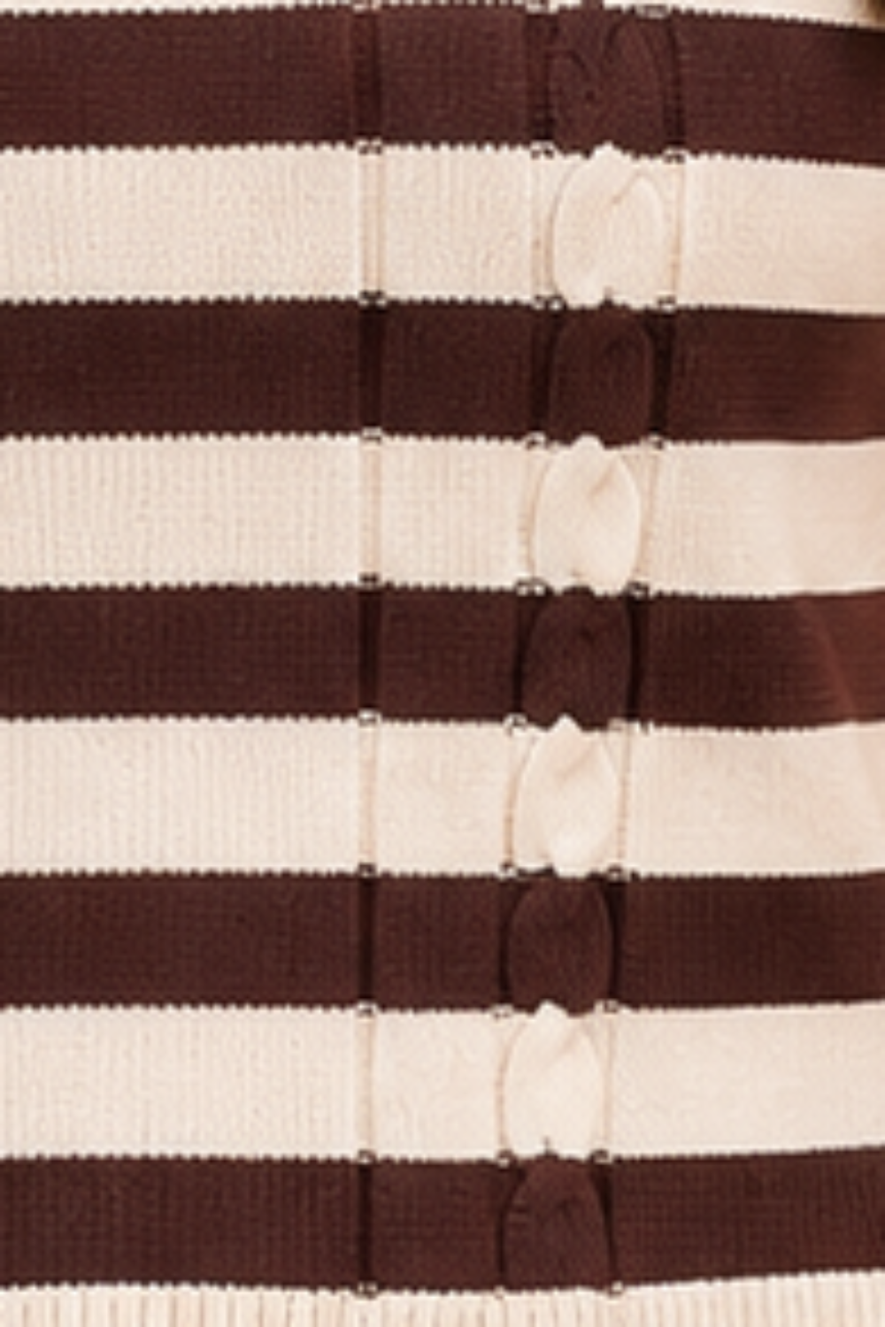 * Sweater
* Round neck
* Short sleeve
* Ribbed
* Cable knit
* Striped  
* Slightly stretchy