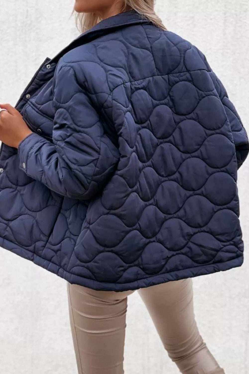 Jacket, quilted, snap-down, pocketed, collared, lined, long sleeve, snap cuffs, no stretch, back view