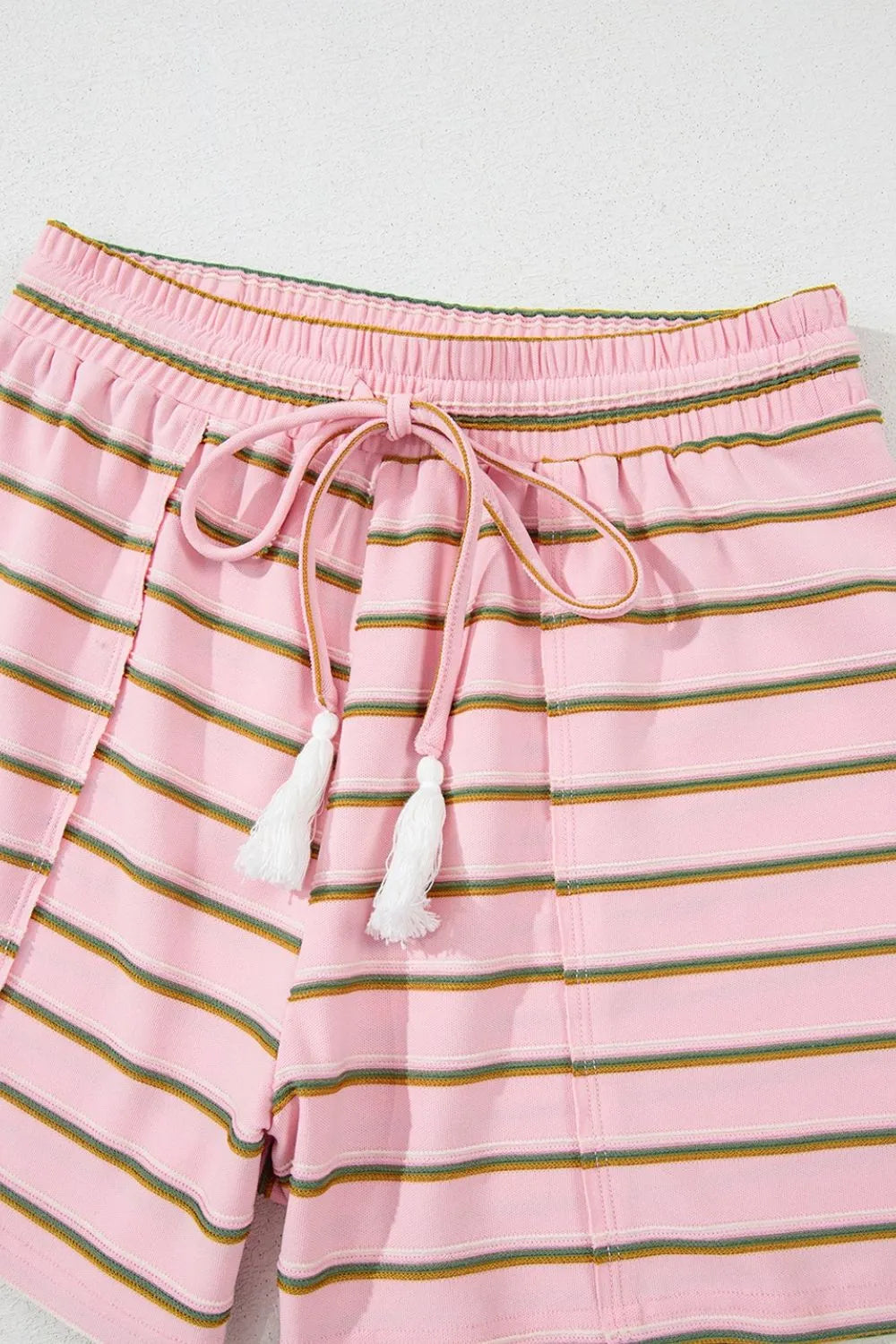 two-piece short set, cap sleeve, round neck, elastic waist, drawstring, front seam detail, wide short striped print, slightly stretchy close up view