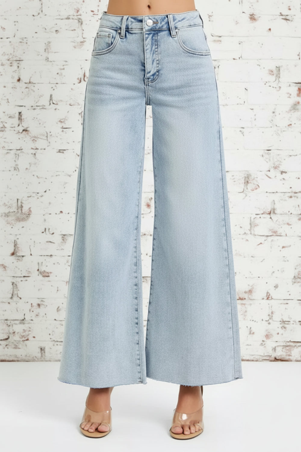 Risen Jeans, full-size, high-rise, wide leg, palazzo style, light wash, raw hem, button/zipper closure, belt loops, pocketed, slightly stretchy, front view
