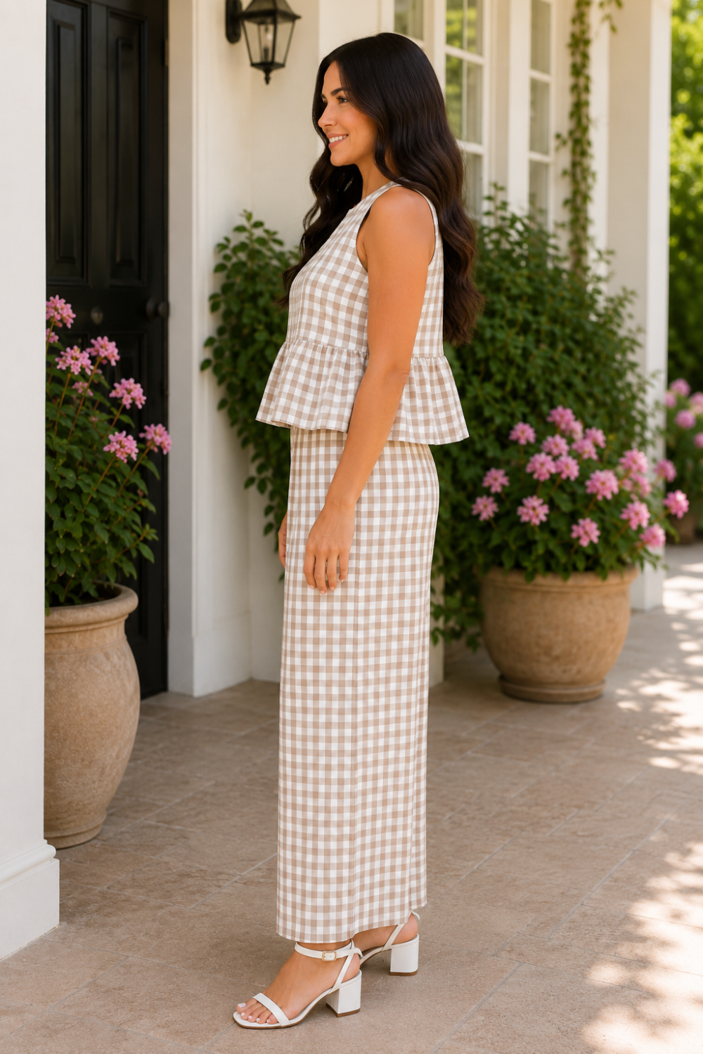 * Two-piece set
* Round neck
* Sleeveless
* Buttoned back closure
* Open back
* Elastic waist
* Pocketed
* Wide leg
* Ruffled
* No stretch