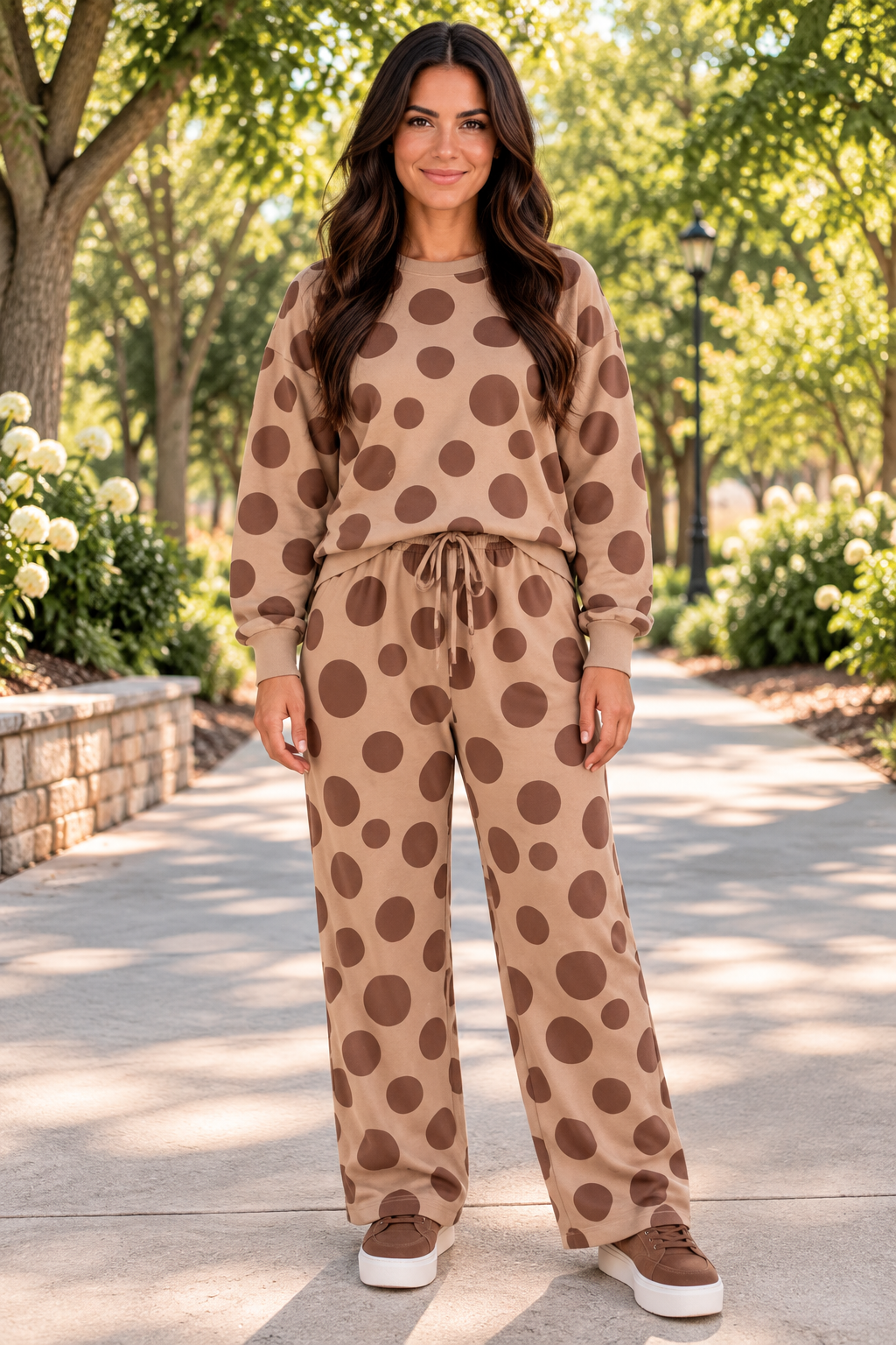 Point Taken Pant Set In Brown with an brown-and-tan polka-dot sweatshirt and matching wide-leg drawstring pants front view.