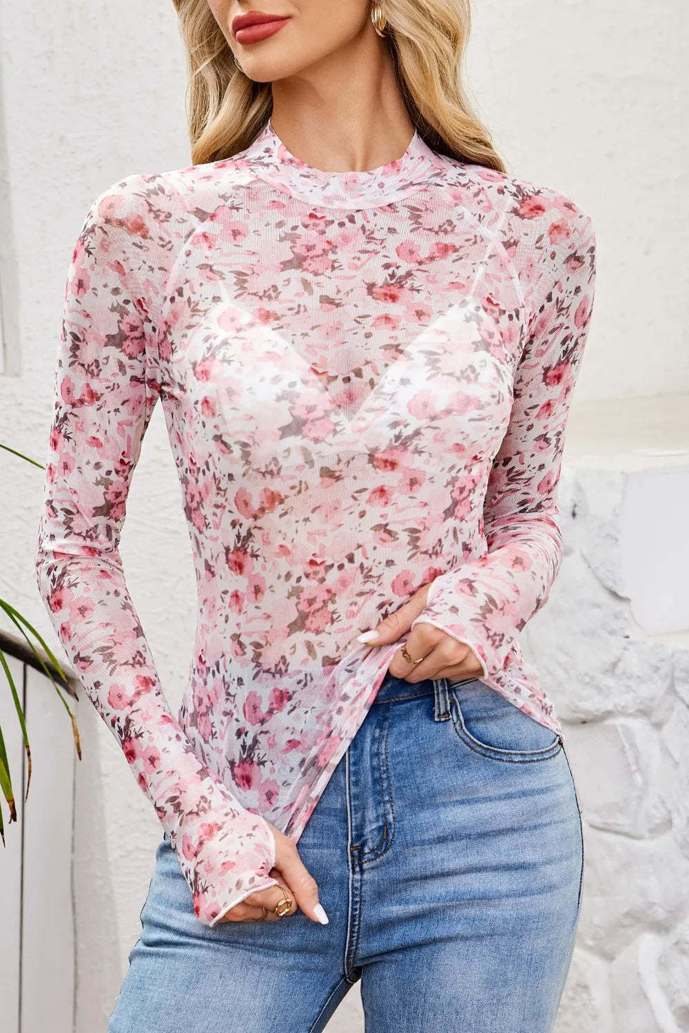 top, mesh, floral print, mock neck, long sleeve, thumb hole, stretchy, front view
