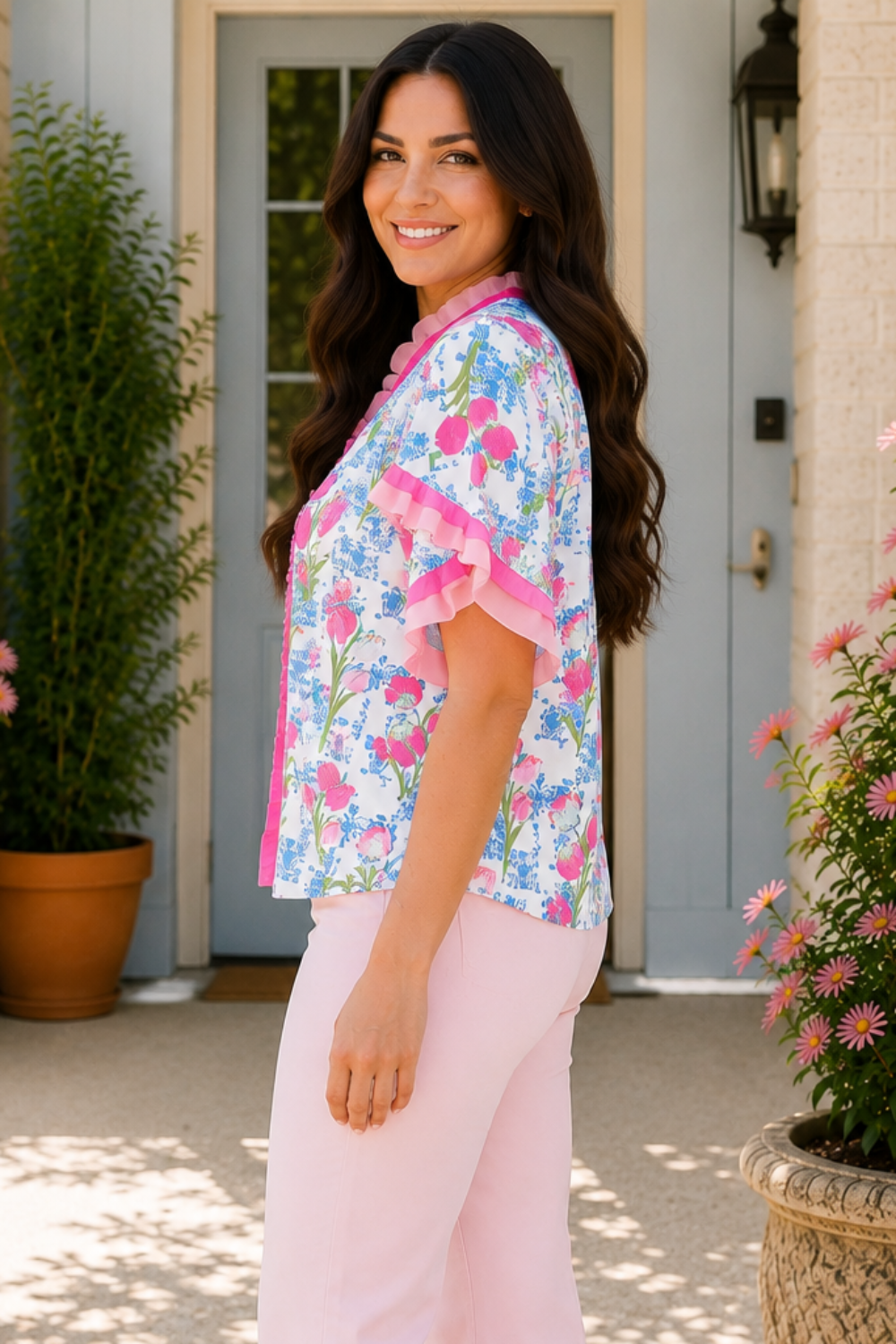 * V-neck
* Ruffled short sleeve
* Contrast trim
* Ruffled
* Textured
* No stretch