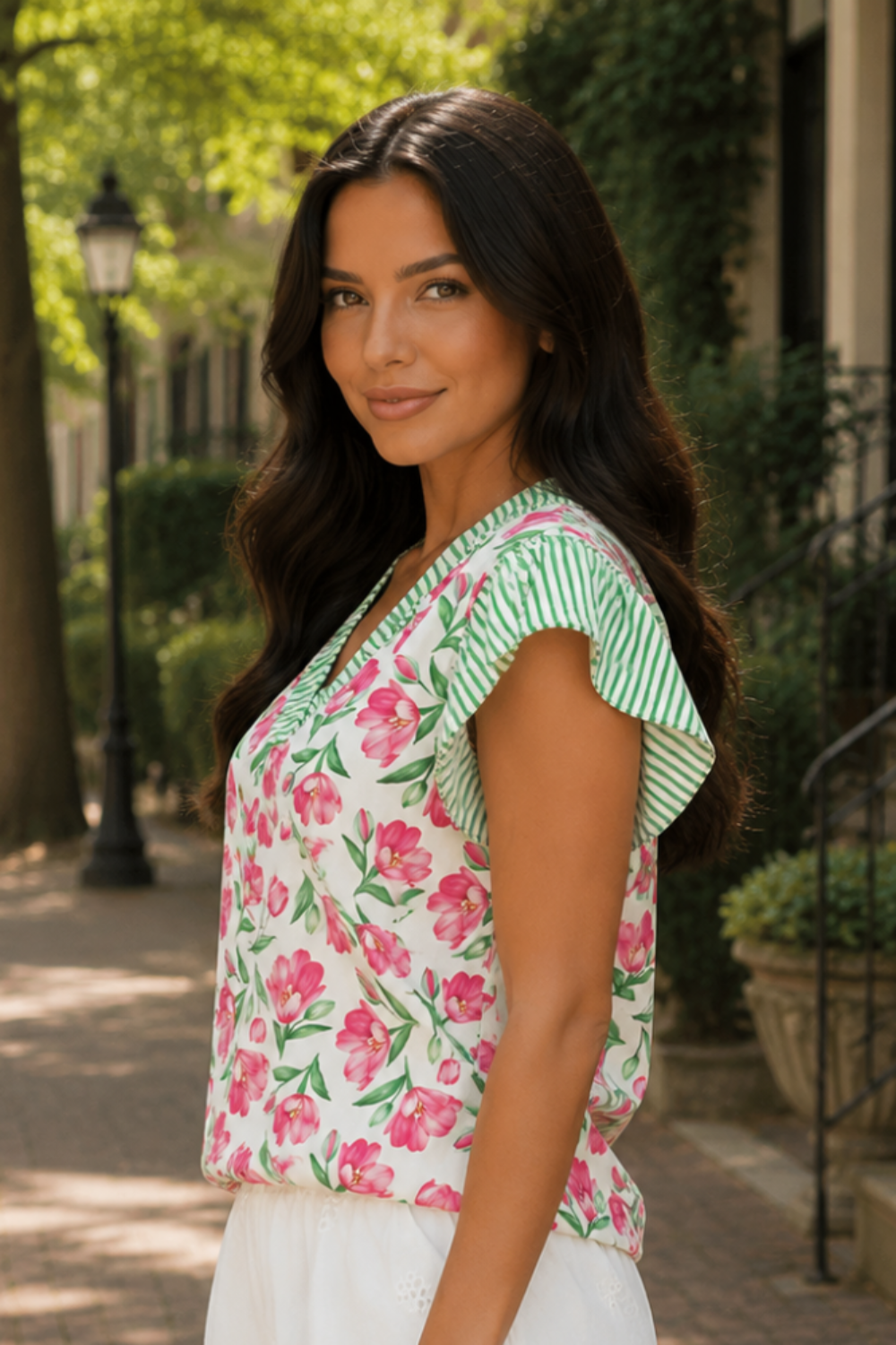 * V-neck
* Flutter sleeves
* Floral and stripe pattern
* Frill
* No stretch