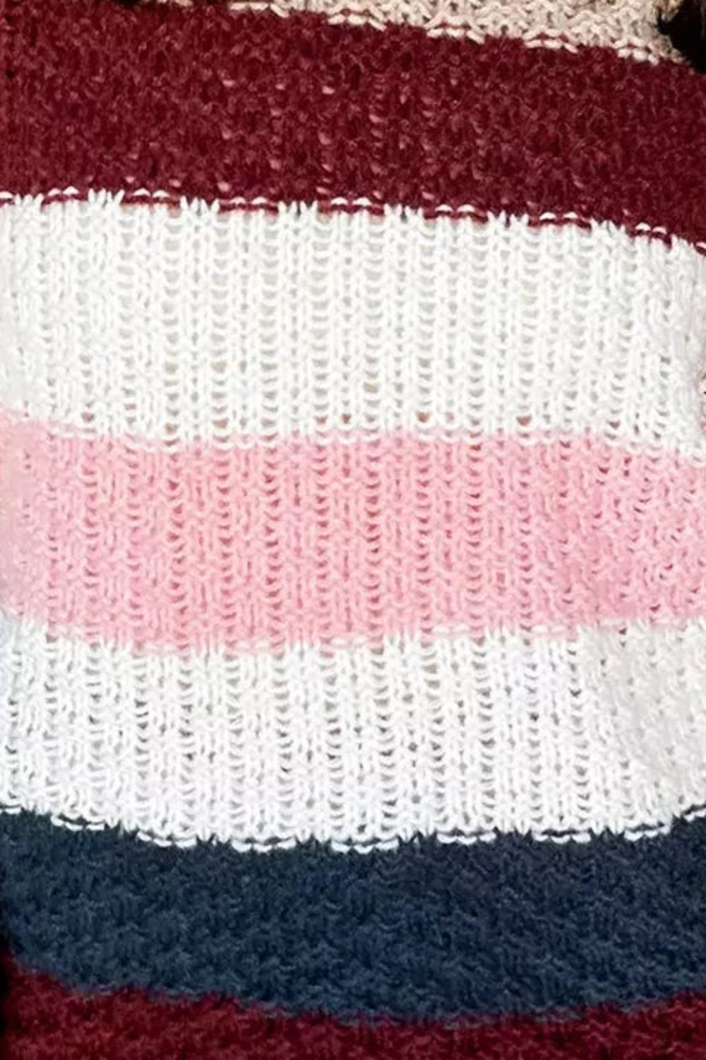 * Sweater
* Striped knit
* Round neck
* Long sleeve
* Drop shoulder
* Ribbed
* Stretchy 