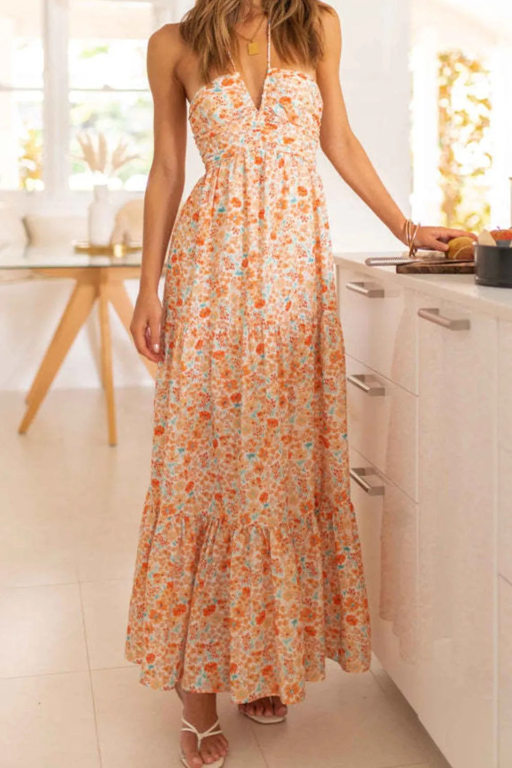 Maxi dress, back zipper, halter tied, v-neck, ruched, tiered, ruffled, partially lined, no stretch, front view