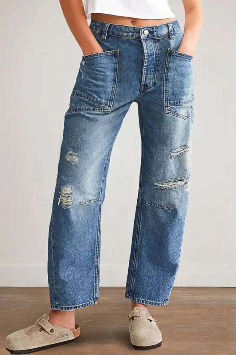 Jeans, high-waist, medium vintage wash, relaxed fit, shirred, distressed, pocketed, button/zipper closure, belt loops, front patch pockets, slightly stretchy, front view