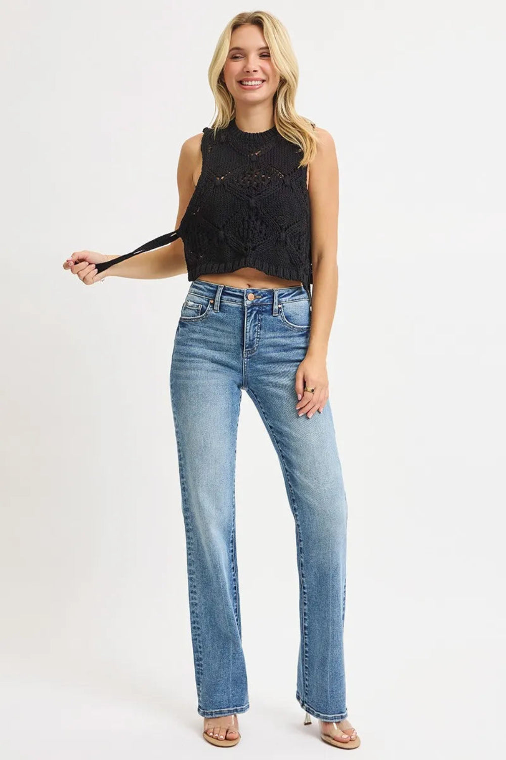 Risen jeans, full-size, high-rise, tummy control, straight leg, 5-pocket detail, button-zipper closure, belt loop detail, medium vintage wash, slightly stretchy, front view