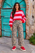 Front view of the Incognito Jeans in muted taupe and gray camouflage with wide cropped legs and oversized patch pockets.