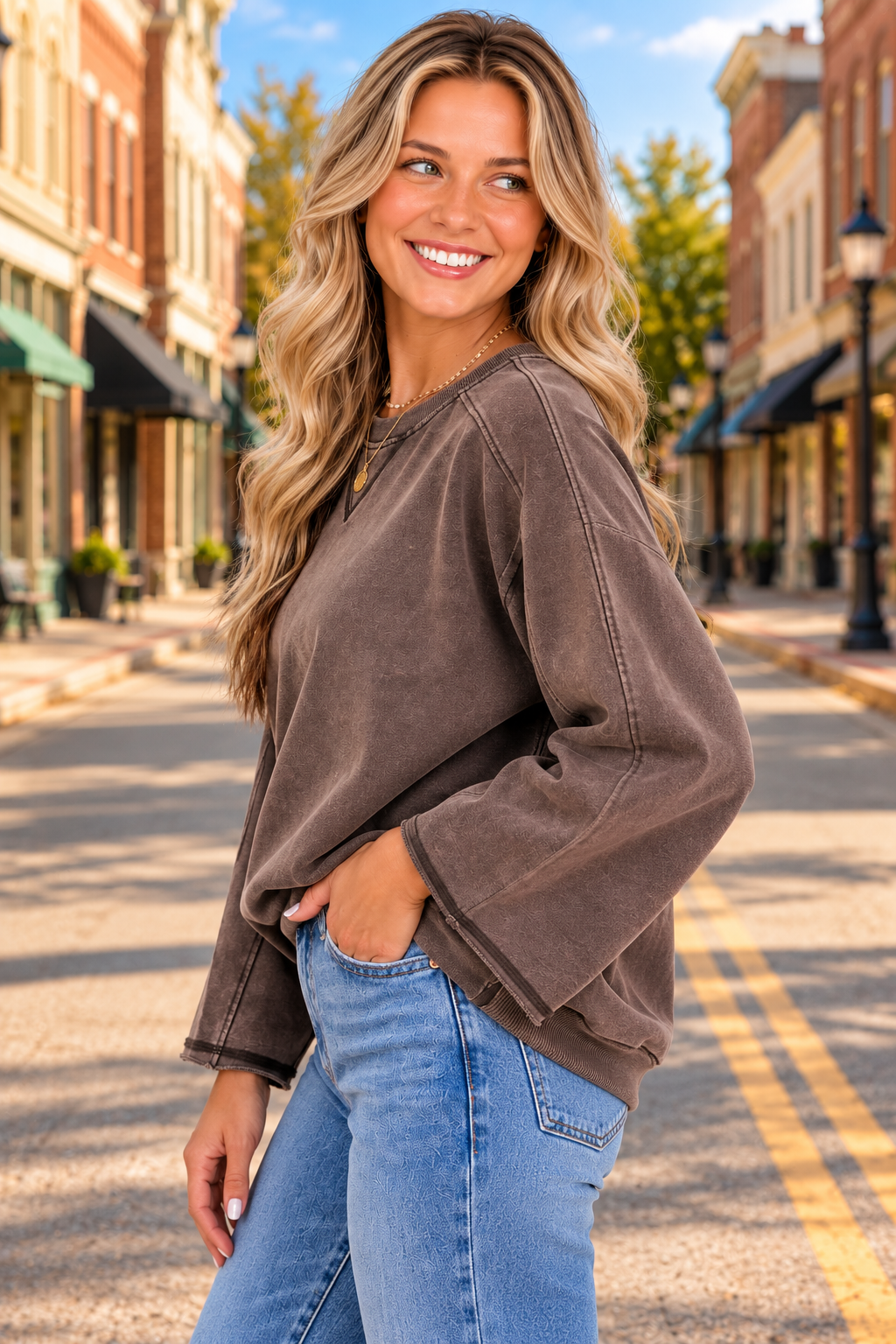 Always On Time Top in washed mocha brown with subtle textured pattern, relaxed fit, wide long sleeves, V-stitch neckline and ribbed hem.