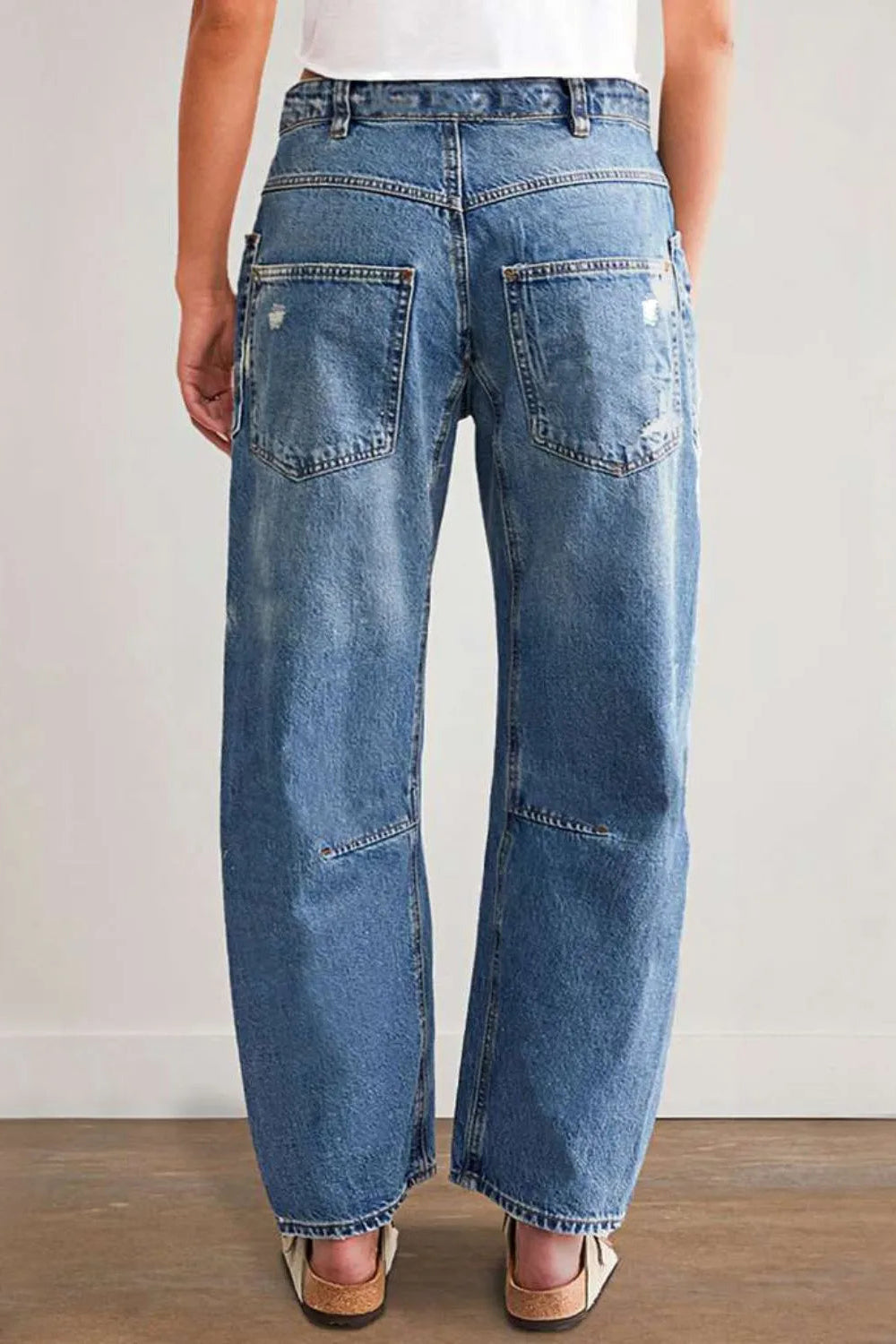 Jeans, high-waist, medium vintage wash, relaxed fit, shirred, distressed, pocketed, button/zipper closure, belt loops, front patch pockets, slightly stretchy, back view