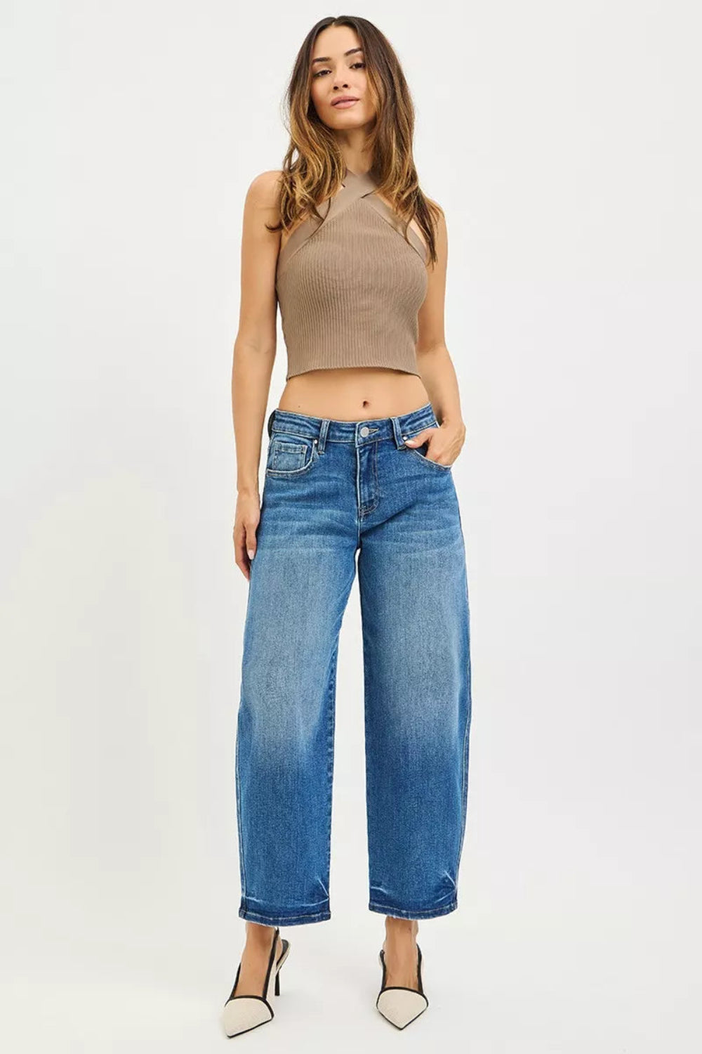 Risen Jeans, mid-rise, raw hem, slouchy, cropped, barrel shape, belt loops, pocketed, button/zipper closure, medium wash, slightly stretchy, front view