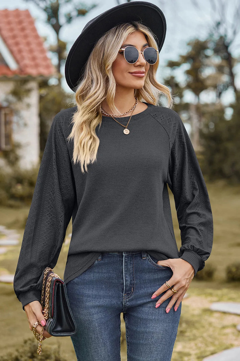 Top, raglan style, round neck, long sleeve, eyelet sleeves, ribbed, opaque, slightly stretchy, front view