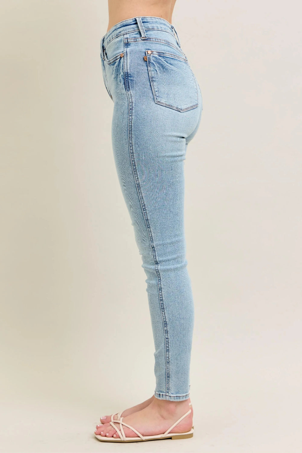 Judy Blue Jeans, full-size, mid-rise, 5-pocket design, light wash, button-zip closure, ankle length, slightly stretchy, side view