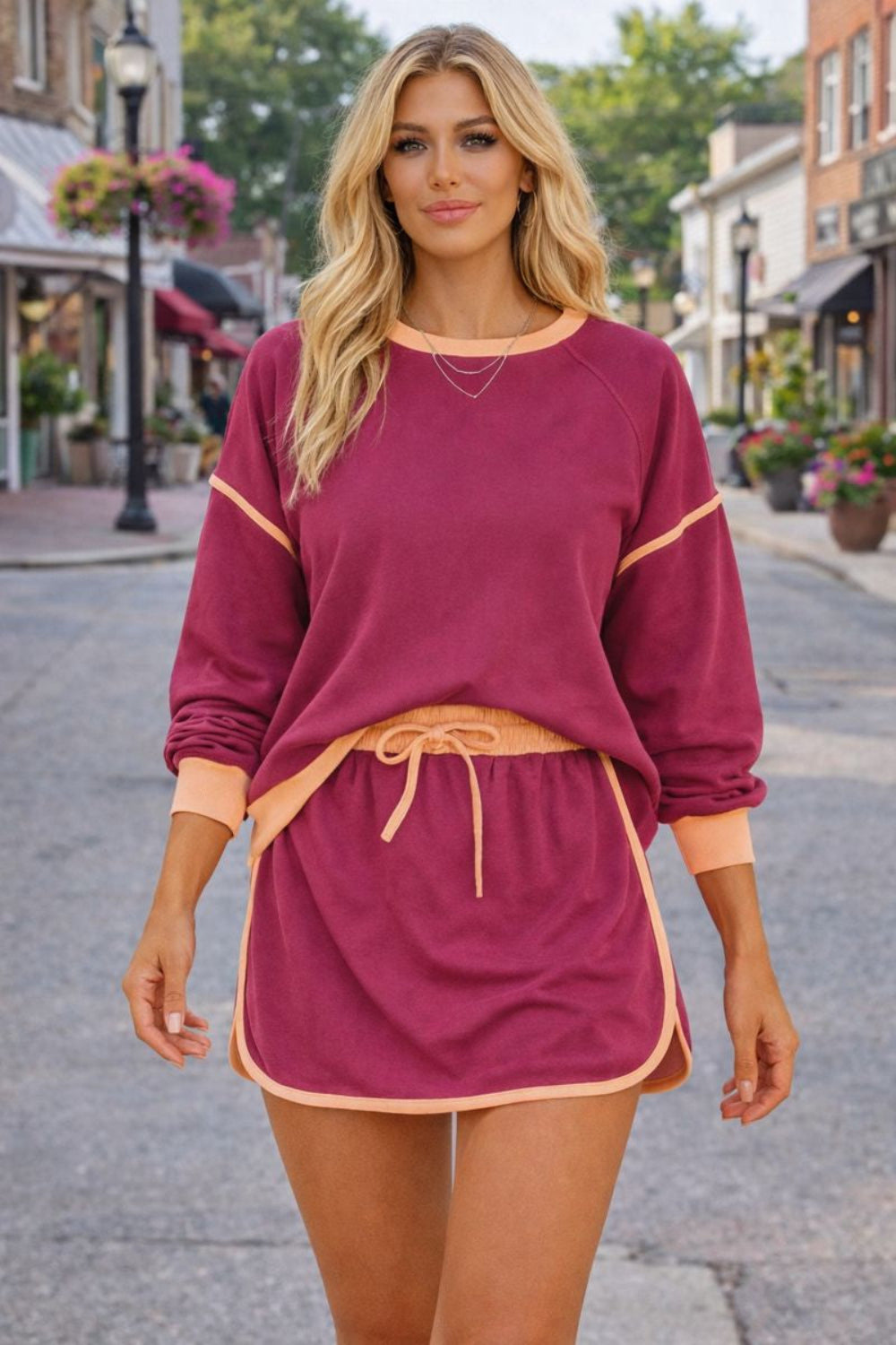 two-piece skort set, contrast trim, long sleeve, round neck, drop shoulder, ribbed, elastic waist, drawstring, pockets, slightly stretchy, front view