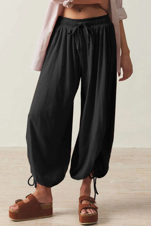 Pants, opaque, ruched, drawstring, elastic waist, opaque, pleated, adjustable hem ties, no stretch, front view

