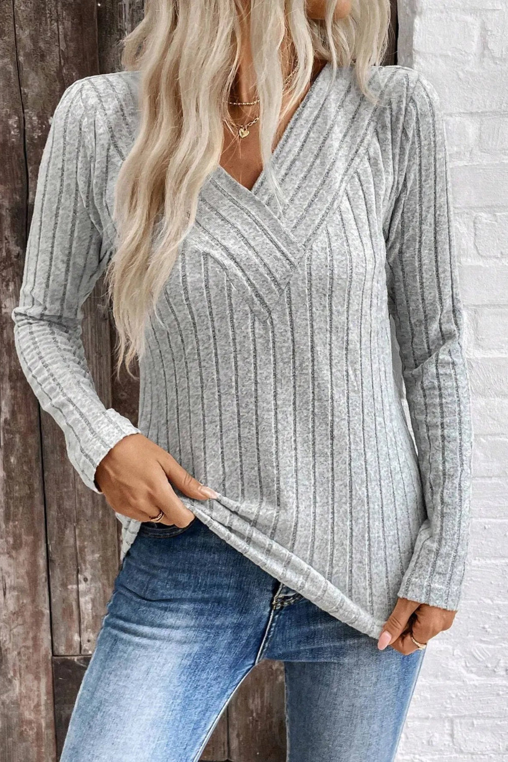 T-shirt, v-neck, long sleeve, ribbed, rounded hem, some stretch, front view