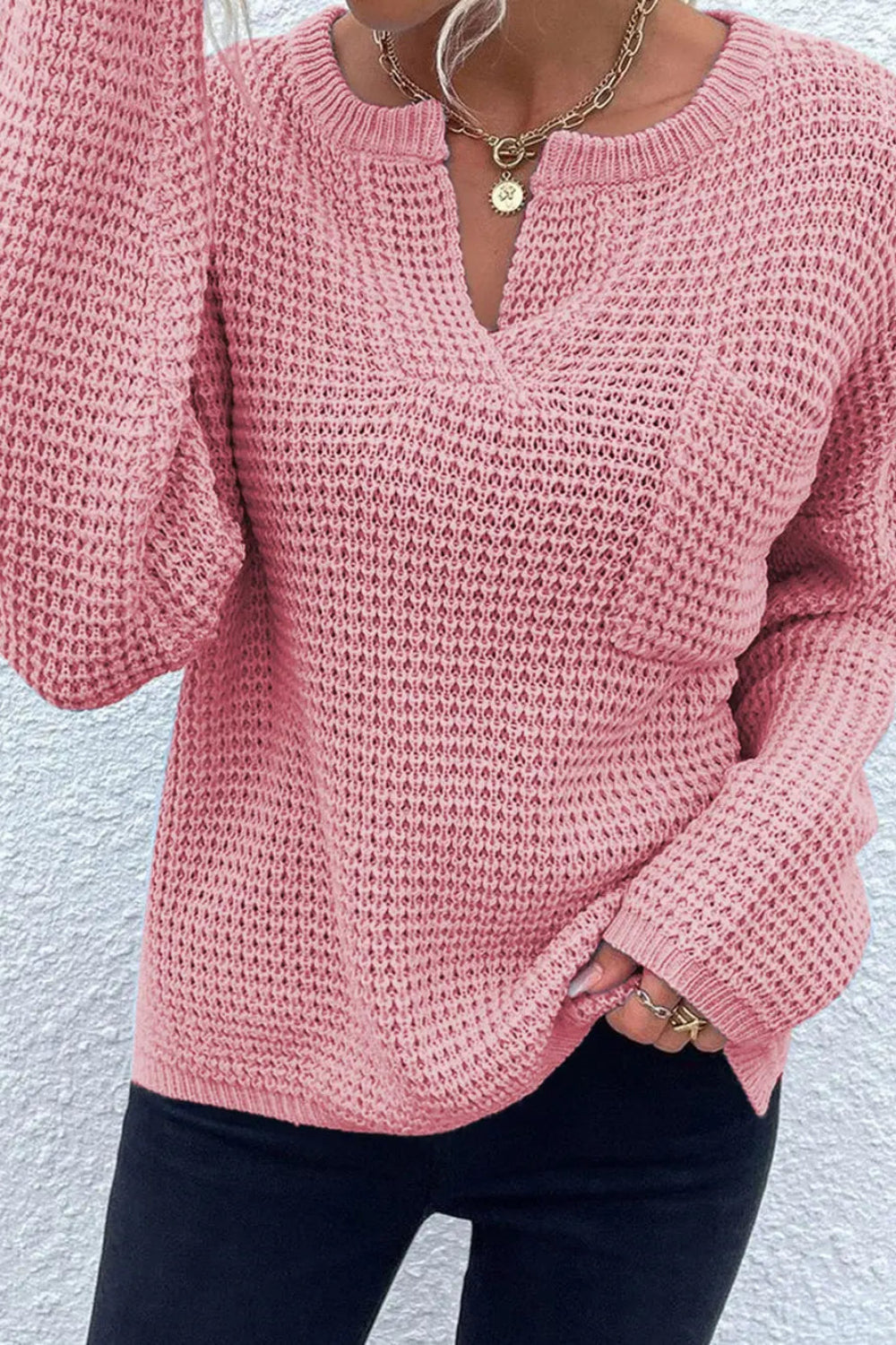 sweater, pullover, long sleeve, drop shoulder, front pocket, notched neck, ribbed, knit, slightly stretchy, front view close up