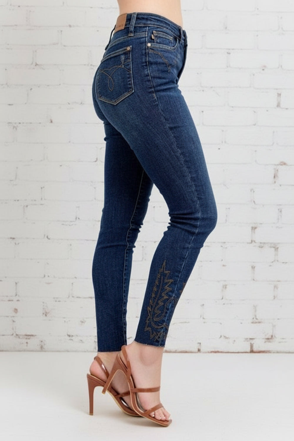 Judy Blue Jeans, full-size, high-rise, skinny, dark wash, pocketed, belt loops, button/zipper closure, embroidered, stretchy, side view