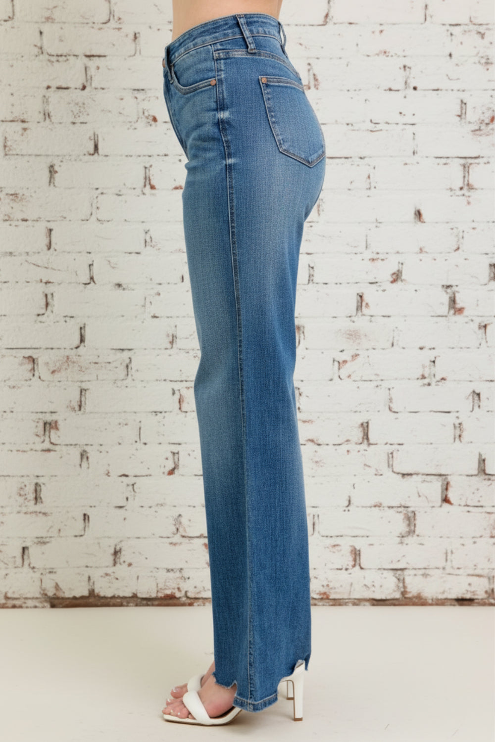 Judy Blue Jeans, full-size, high-rise, tummy control, medium wash, belt loops, button/zipper closure, pocketed, destroyed, chewed hem, wide leg, slightly stretchy, side view