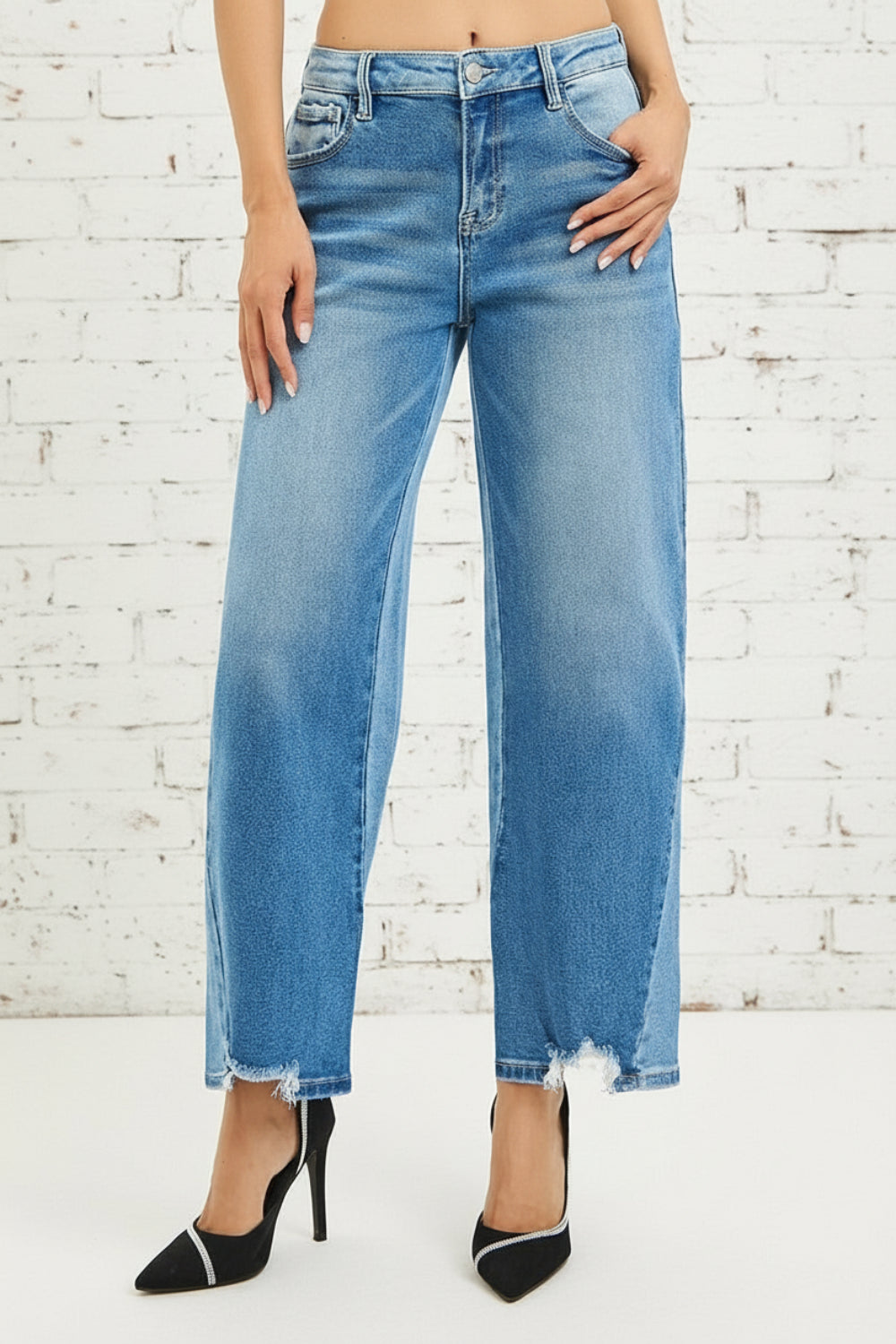 Risen Jeans, full-size, mid-rise, slouchy, cropped, barrel shape, dark combo, raw hem, belt loops, button/zipper closure, pocketed, slightly stretchy, front view
