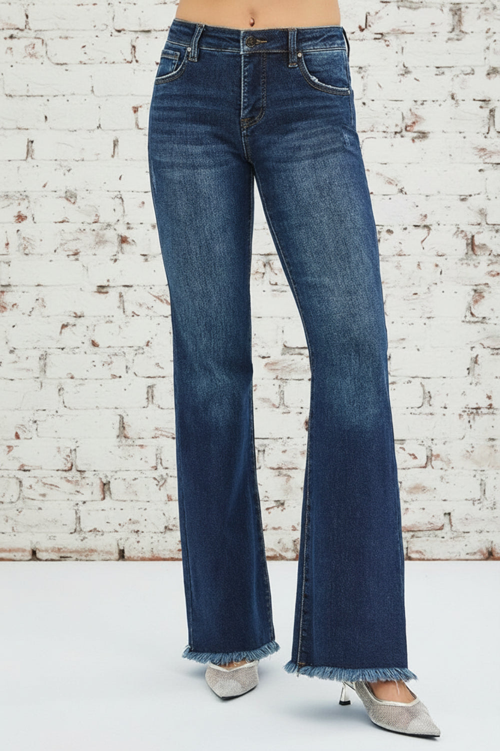 Risen jeans, full-size, high-rise, tummy control, flare, raw hem, distressed, 5-pocket detail, button-zipper closure, belt loop detail, dark vintage wash, slightly stretchy, front view
