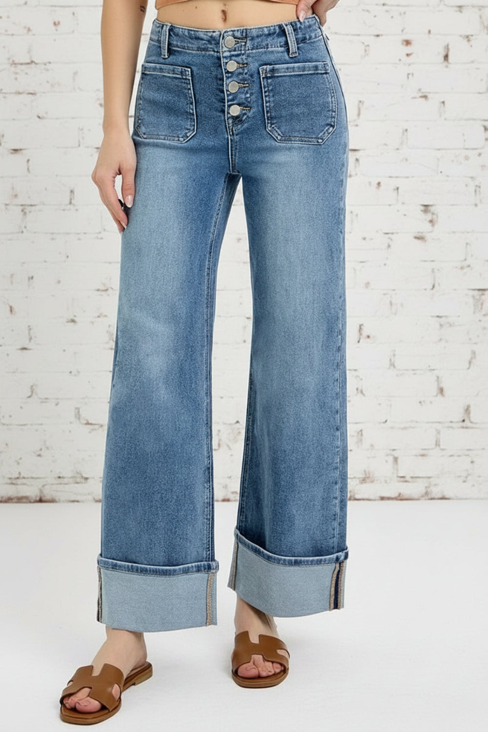 Risen Jeans, high-waisted, front patch pockets, button up, light wash, wide leg, cuffed, slightly stretchy front view
