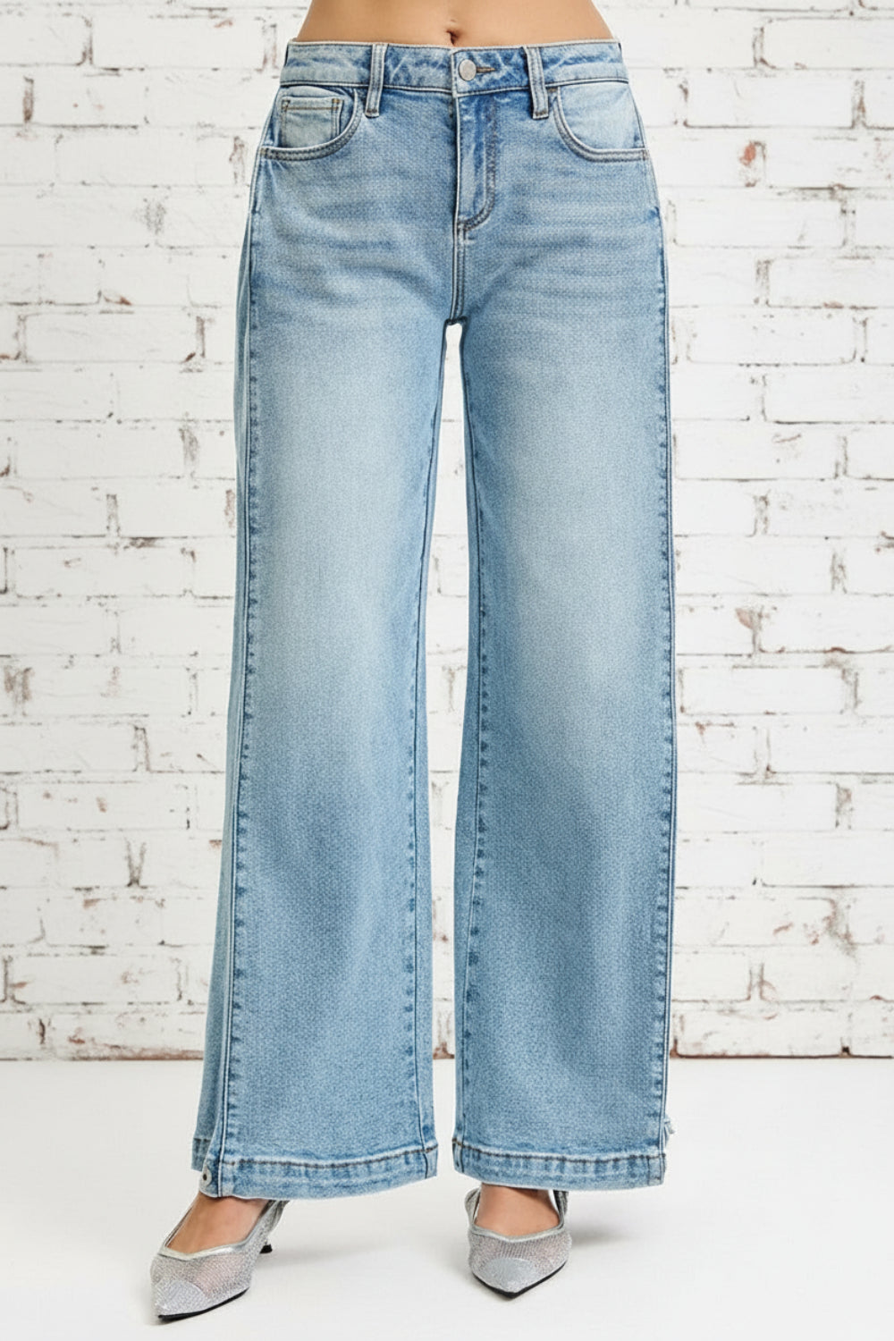 Risen Jeans, Mid-rise, wide barrel, transferable, leg snap, closed hem, medium washed, belt loops, button/zipper closure, pockets, slightly stretchy, front view