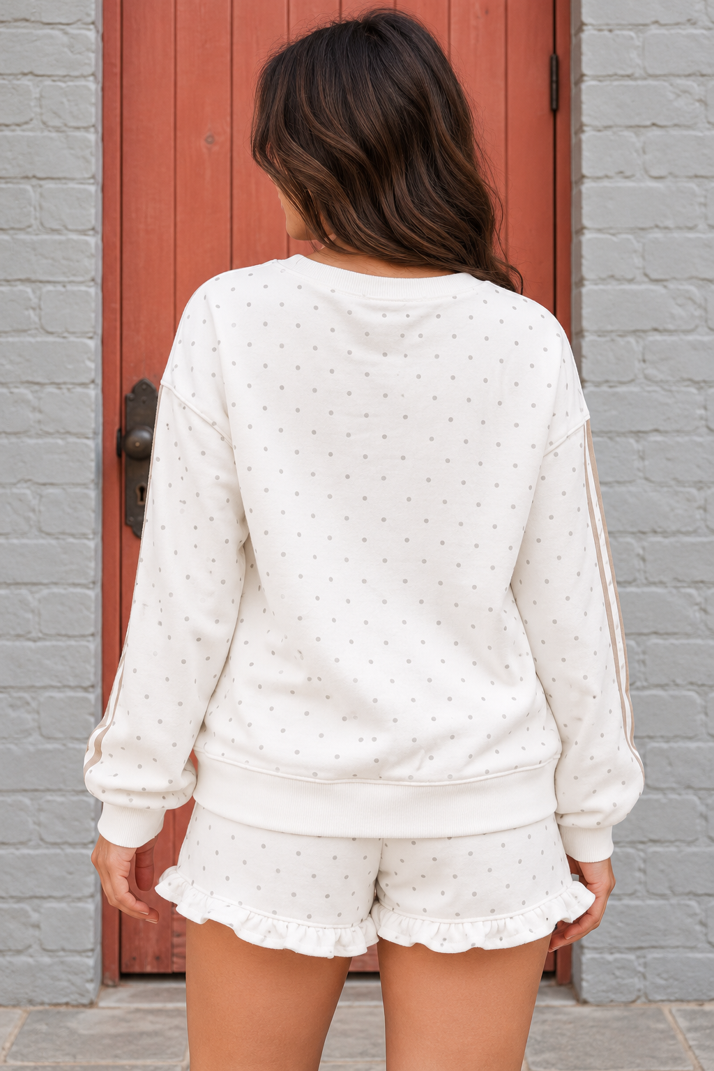 Cozy Dream Short Set in ivory with gray polka dots, a long-sleeve striped top, and matching ruffle-trim shorts back view.