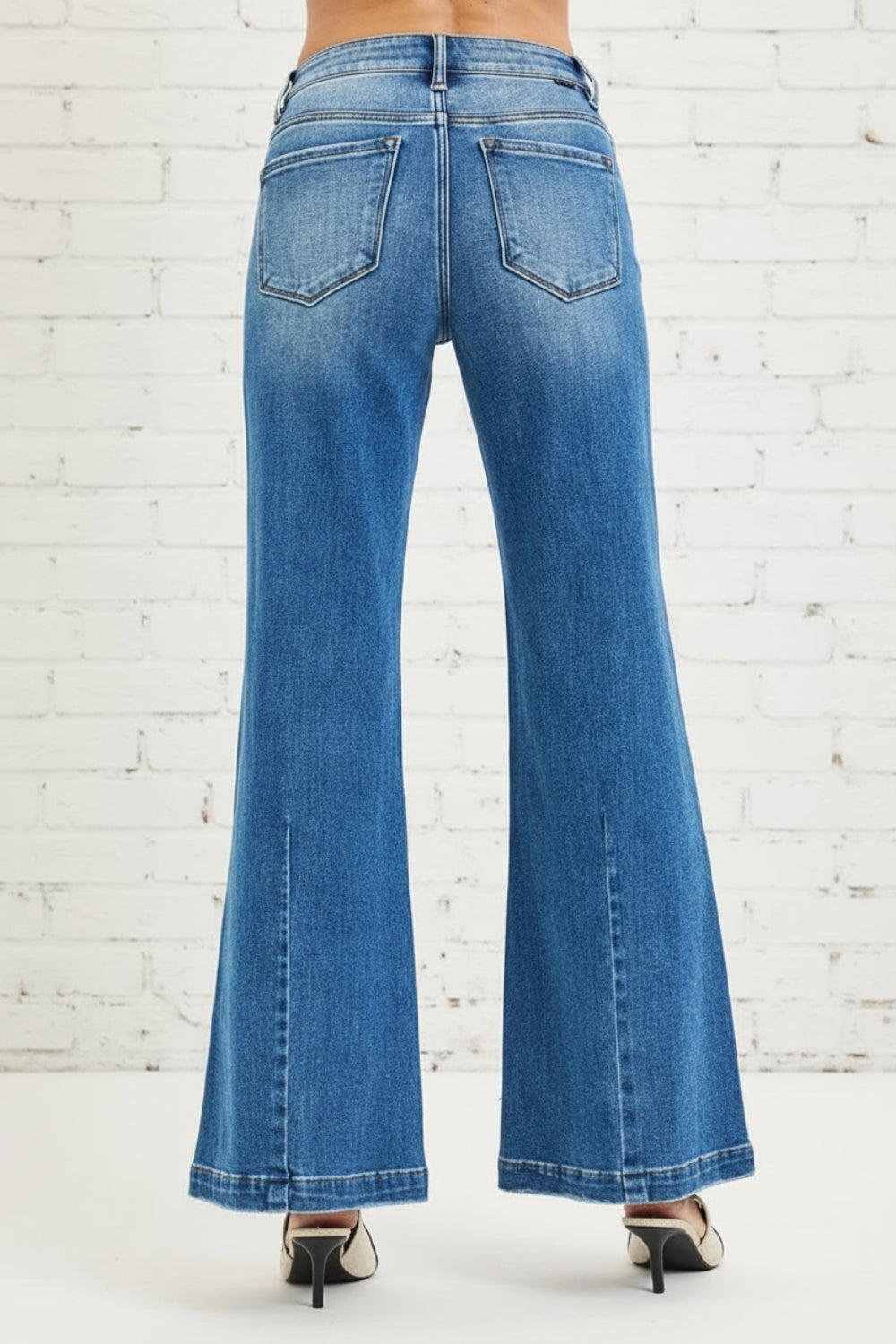 Risen Jeans, full-size, mid-rise, wide leg, flared look, medium wash, belt loops, button/zipper closure, pocketed, bottom dark, slightly stretchy, back view