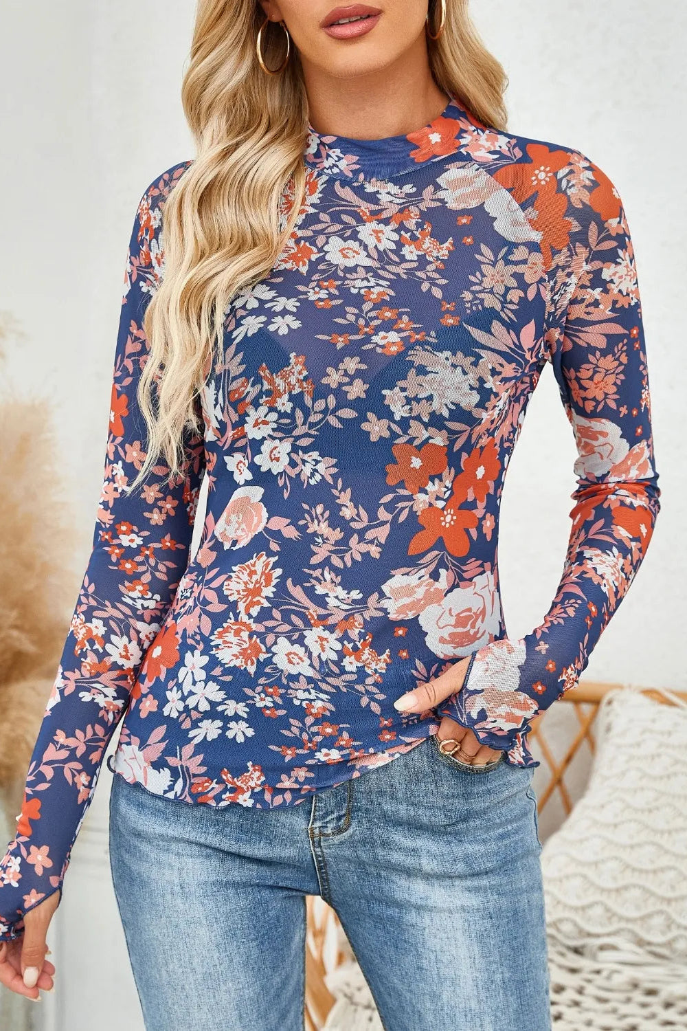 top, mesh, floral print, mock neck, long sleeve, thumb hole, stretchy, front view