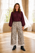 * Pants
* Zebra print
* Elastic waist
* Drawstring
* Pockets
* High-rise
* Relaxed/shift fit
* Full length
* No stretch