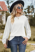 Top, raglan style, round neck, long sleeve, eyelet sleeves, ribbed, opaque, slightly stretchy, front view
