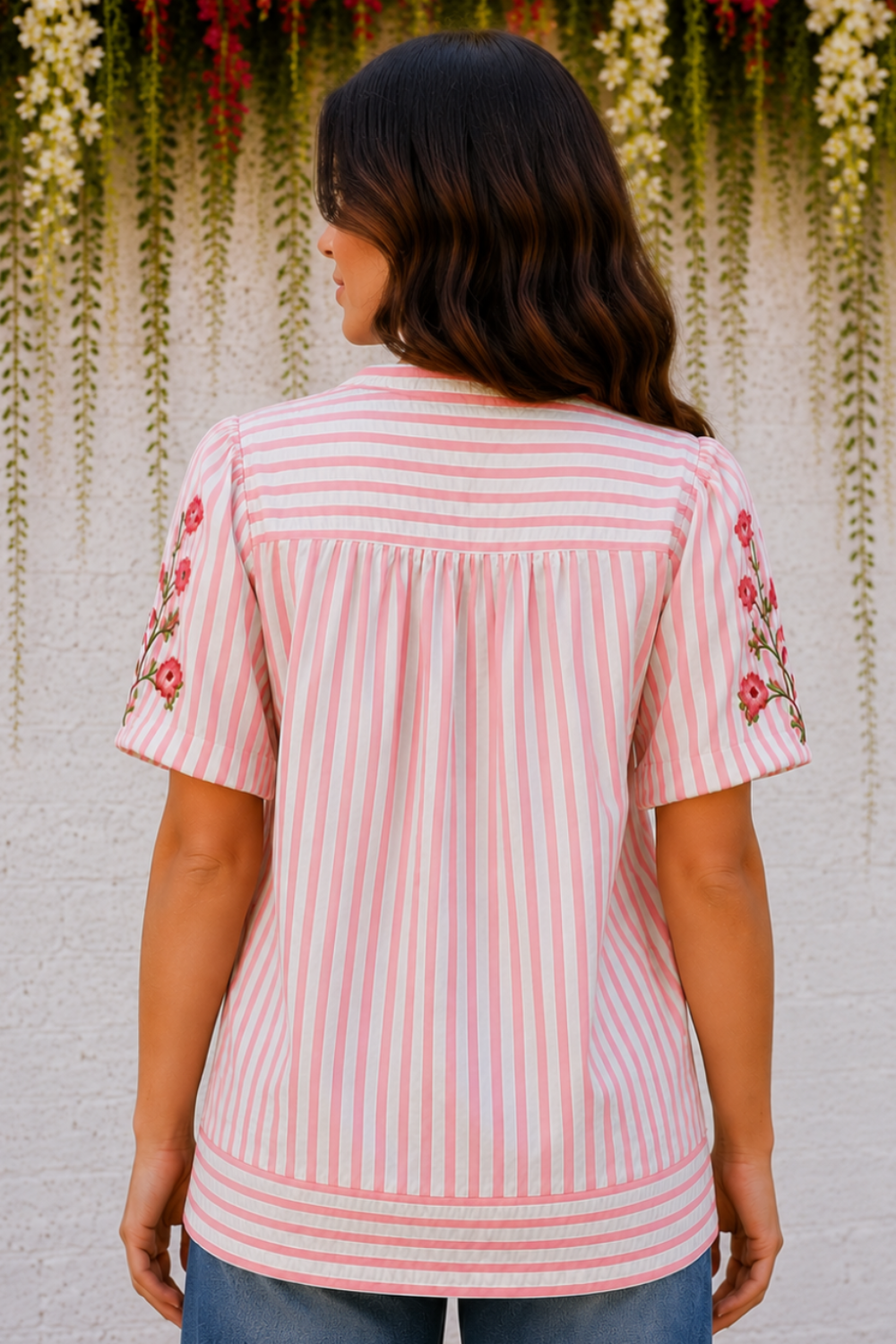 * Pullover
* Notch neck
* Puff sleeve
* Embroidered floral
* Stripe print
* Textured
* Wide hem
* No stretch